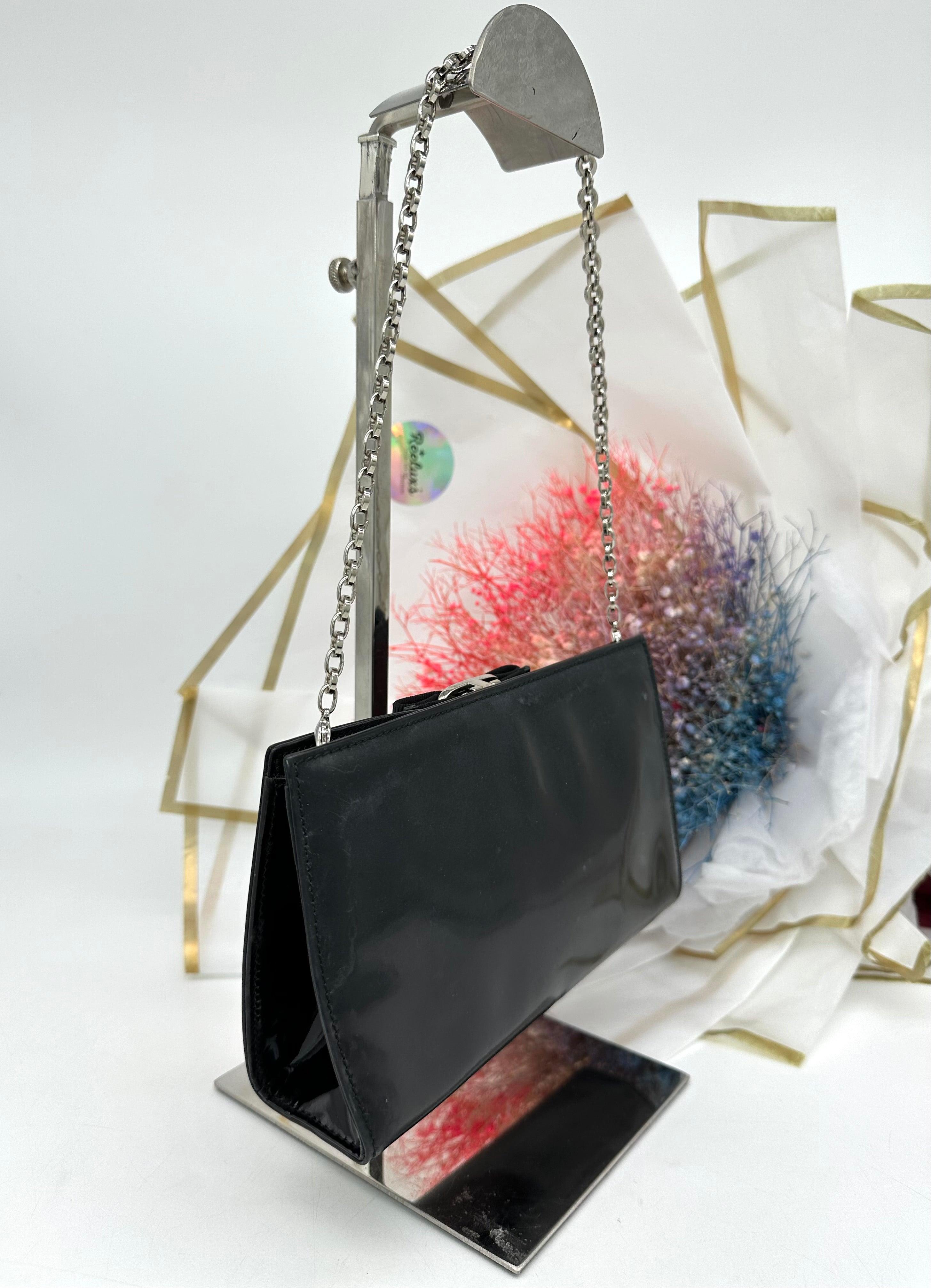 SALVATORE FERRAGAMO
Black Patent Miss Vara Bow Clutch Bag - Reeluxs