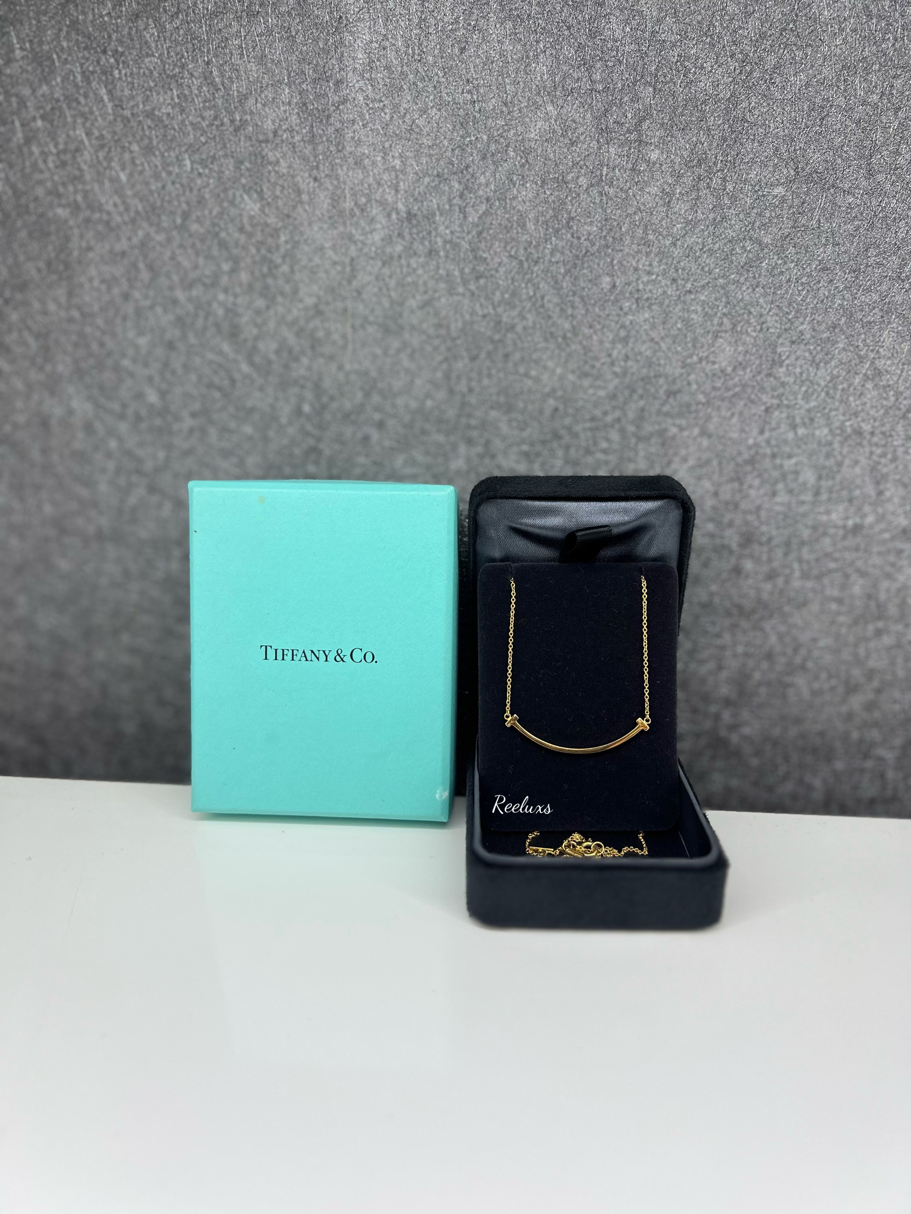 TIFFANY & CO. 18k Gold Small T Smile Pendant Necklace