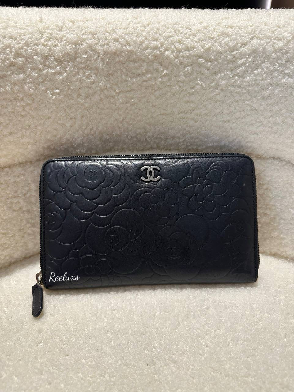 CHANEL Lambskin Camellia Embossed Zip Around Organizer Wallet Black