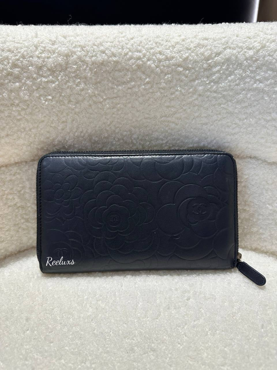 CHANEL Lambskin Camellia Embossed Zip Around Organizer Wallet Black
