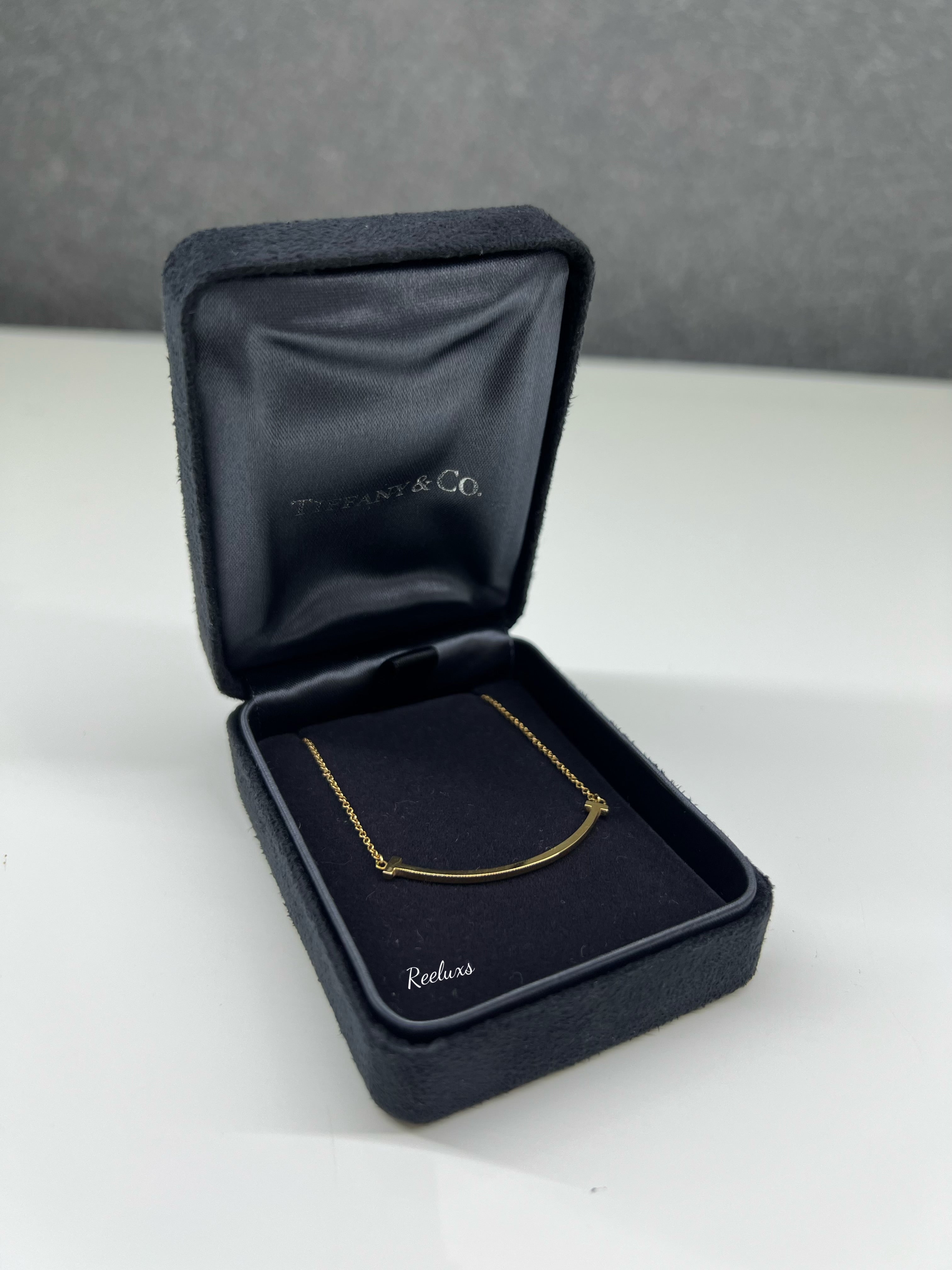 TIFFANY & CO. 18k Gold Small T Smile Pendant Necklace