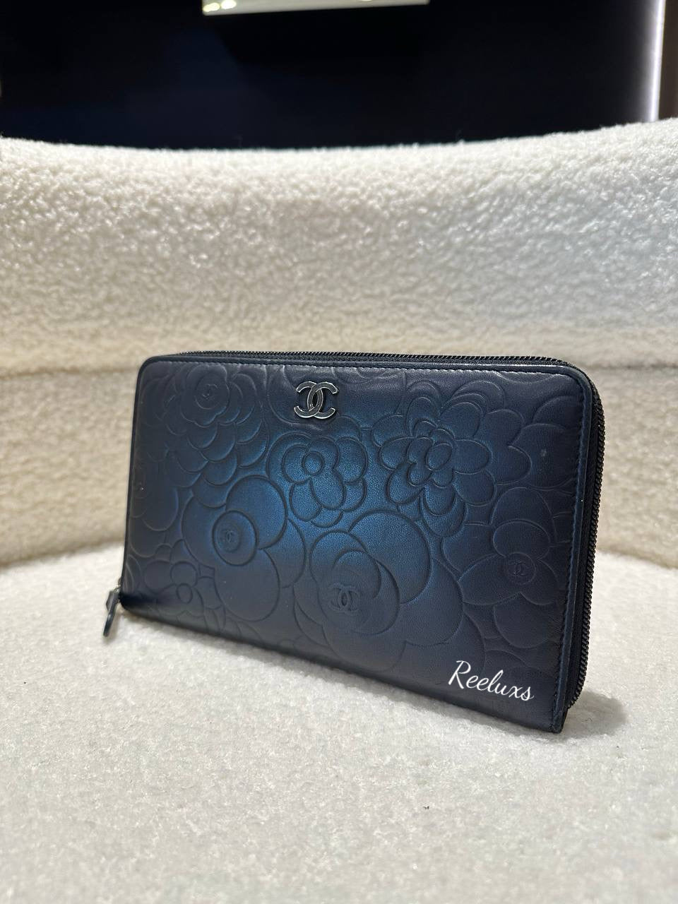CHANEL Lambskin Camellia Embossed Zip Around Organizer Wallet Black
