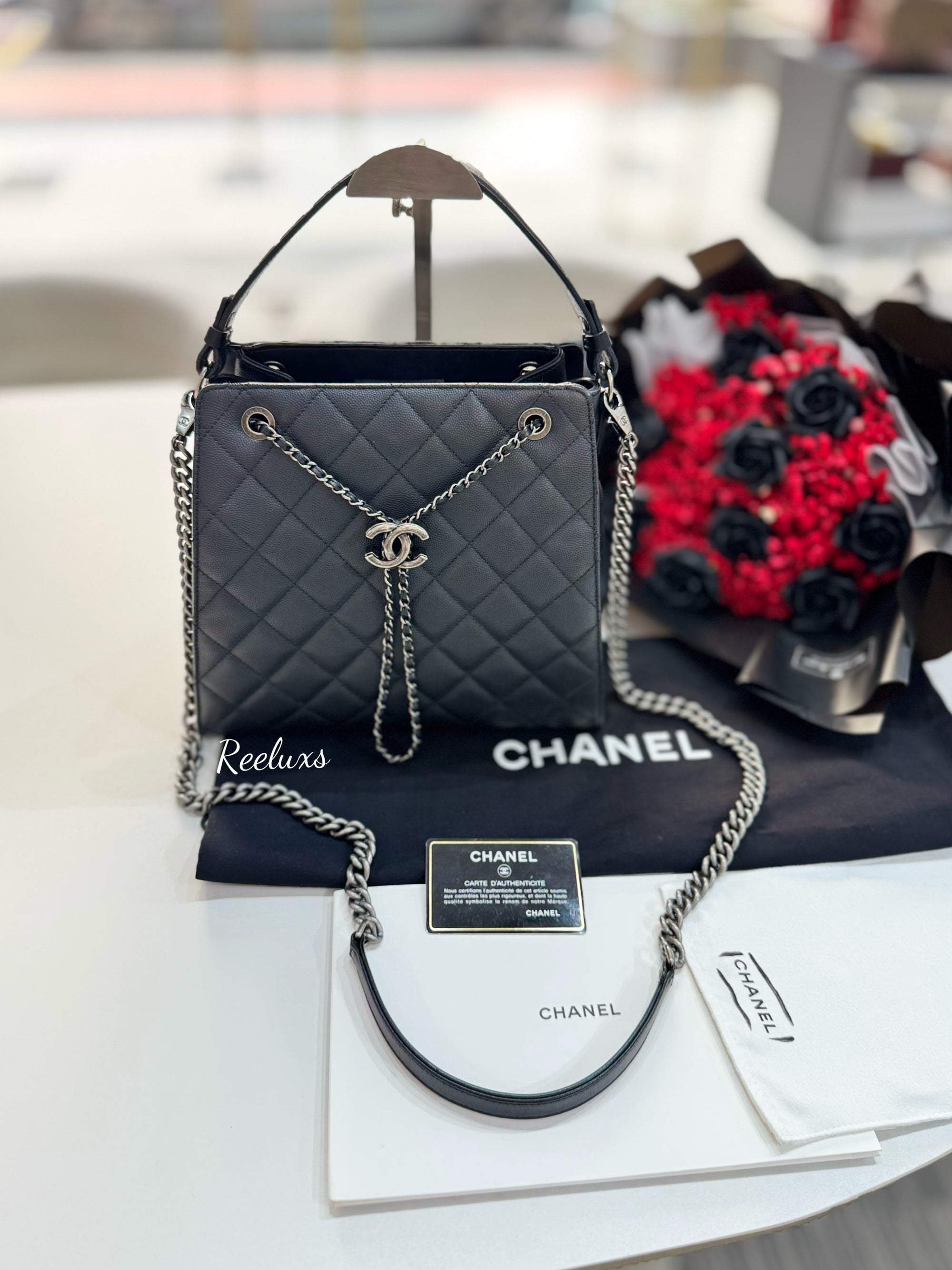 CHANEL Black Quilted
Caviar Leather CC Large Accordion Bucket Bag