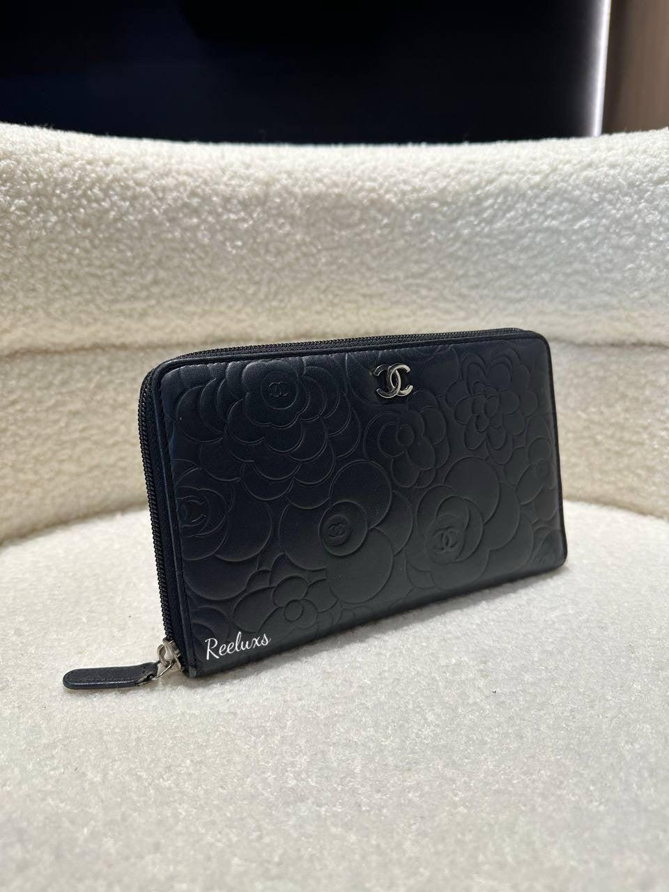 CHANEL Lambskin Camellia Embossed Zip Around Organizer Wallet Black