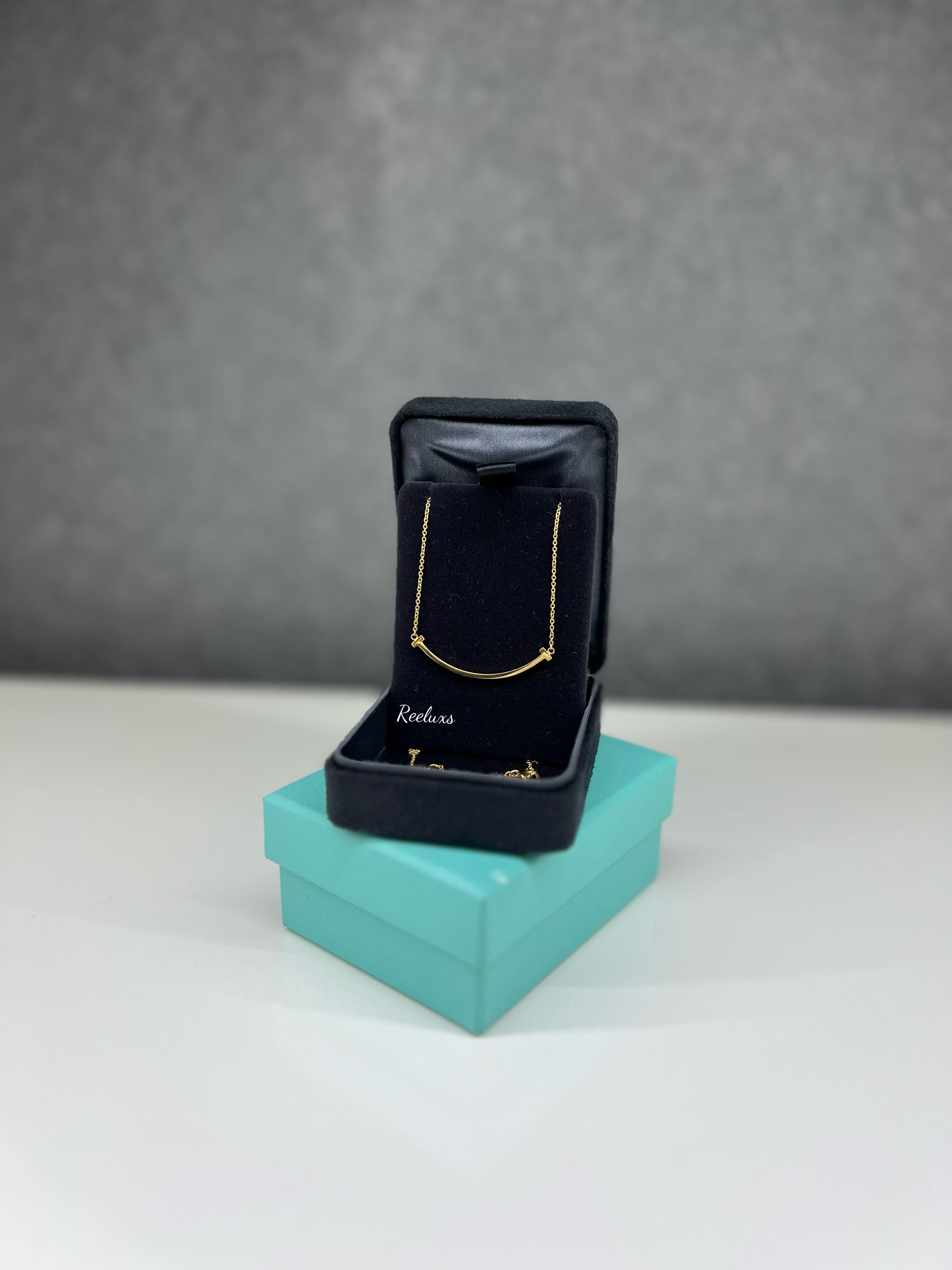 TIFFANY & CO. 18k Gold Small T Smile Pendant Necklace