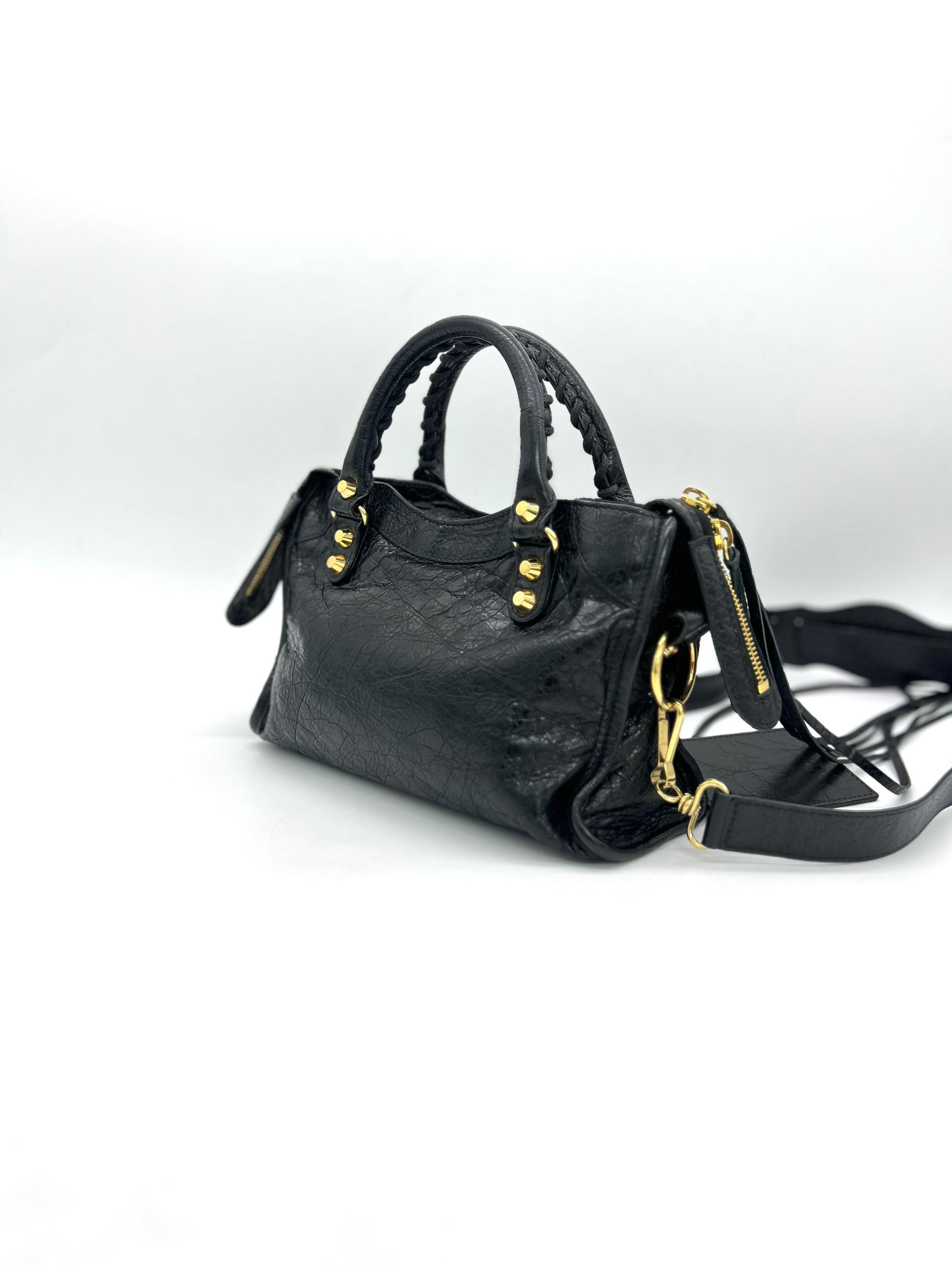 BALENCIAGA
Classic City Mini Leather 2-Way Handbag Black - Reeluxs