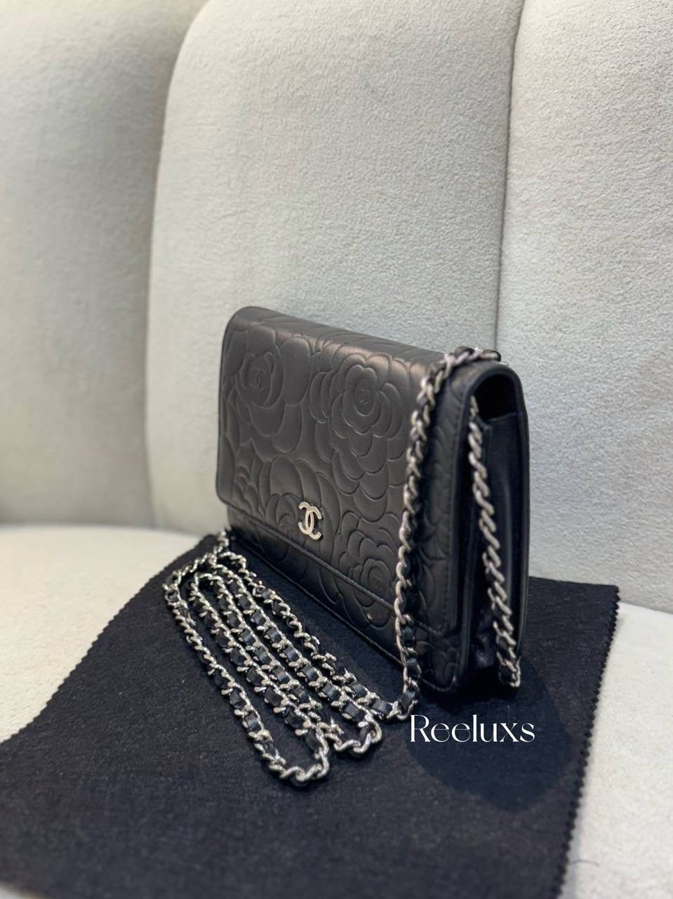 CHANEL Black Camellia Embossed Lambskin Leather Wallet On Chain - WOC