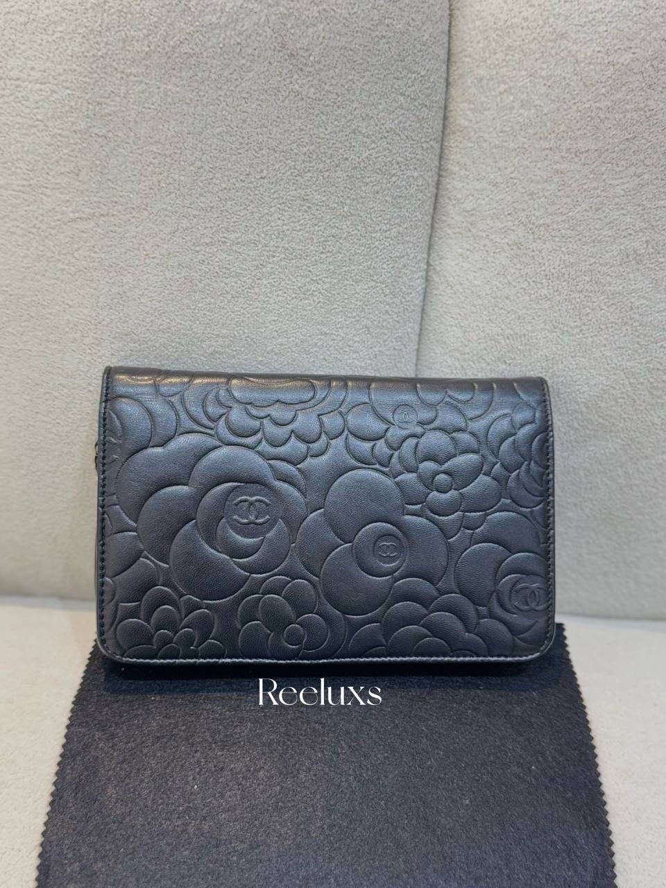 CHANEL Black Camellia Embossed Lambskin Leather Wallet On Chain - WOC