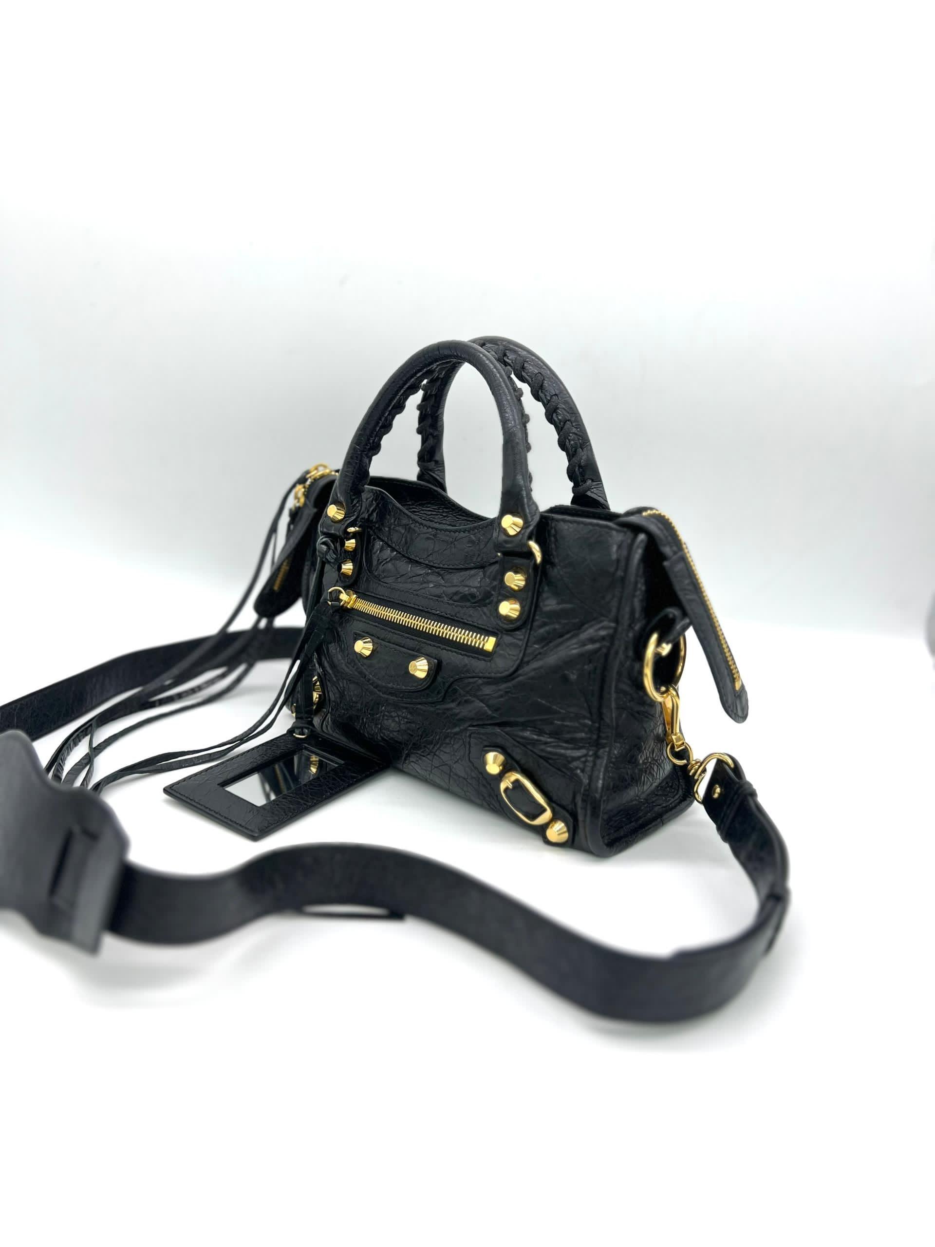 BALENCIAGA
Classic City Mini Leather 2-Way Handbag Black - Reeluxs