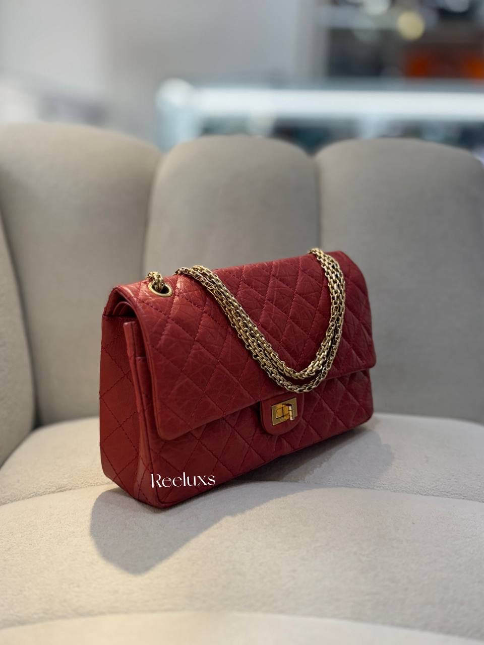 CHANEL Red Quilted Aged Leather Reissue 2.55 Classic Flap Bag GHW