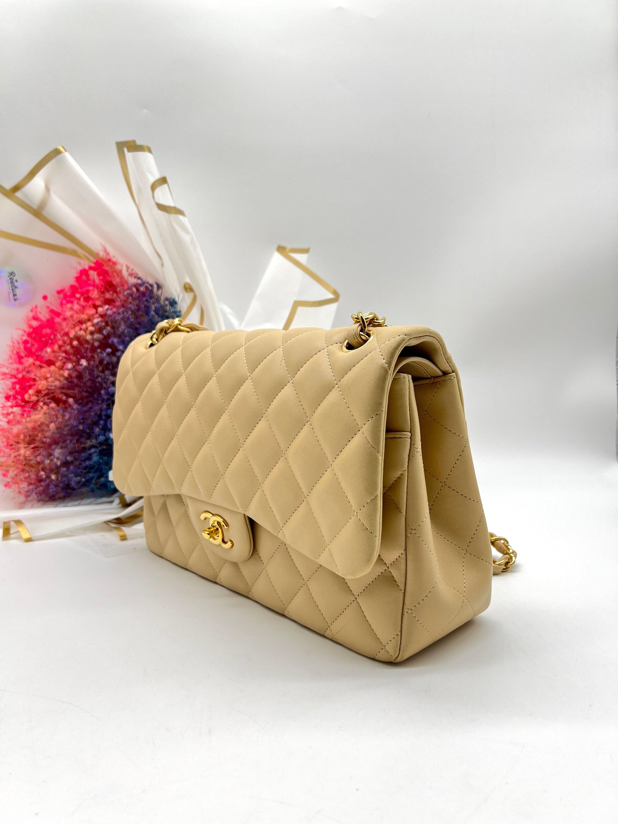 CHANEL Beige Lambskin Jumbo Classic Flap - Reeluxs 