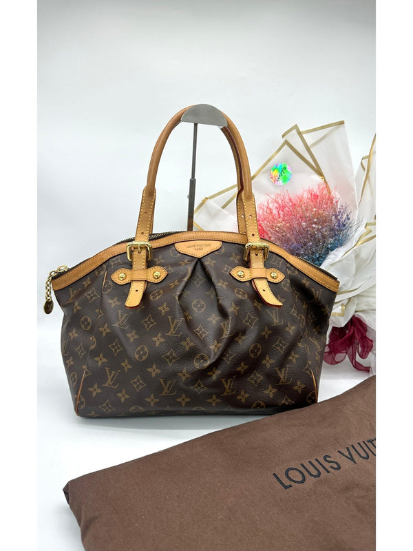 LOUIS VUITTON 
Monogram Tivoli GM Brown - Reeluxs 