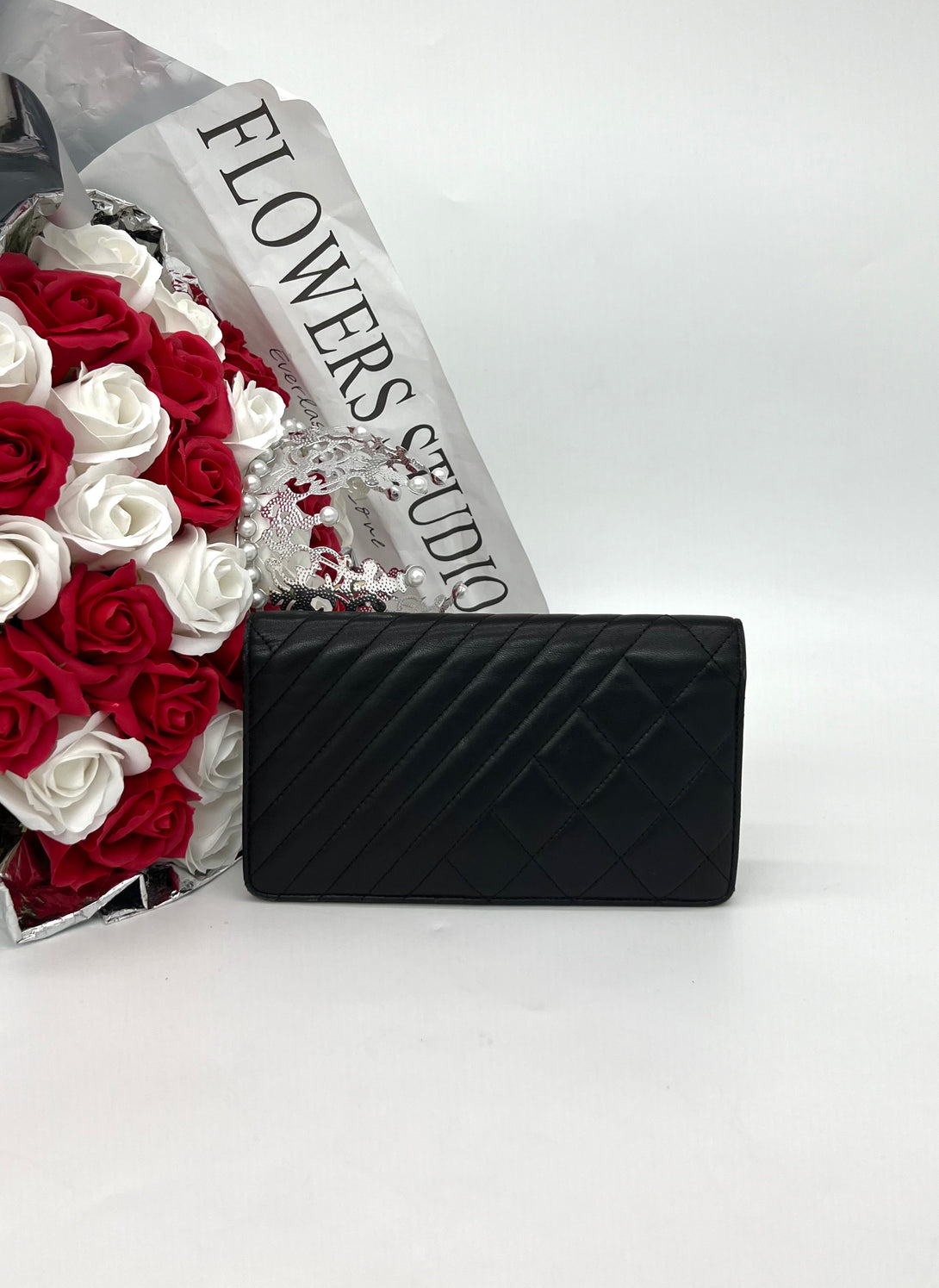 CHANEL Black Zipped Lambskin Wallet - Reeluxs 