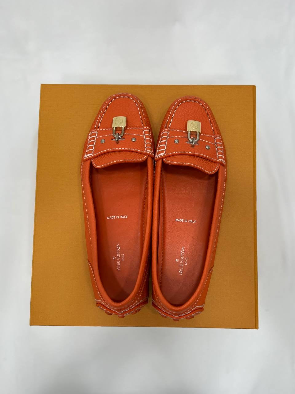 LOUIS VUITTON LV Orange Leather Lock Detail Slip On Loafer