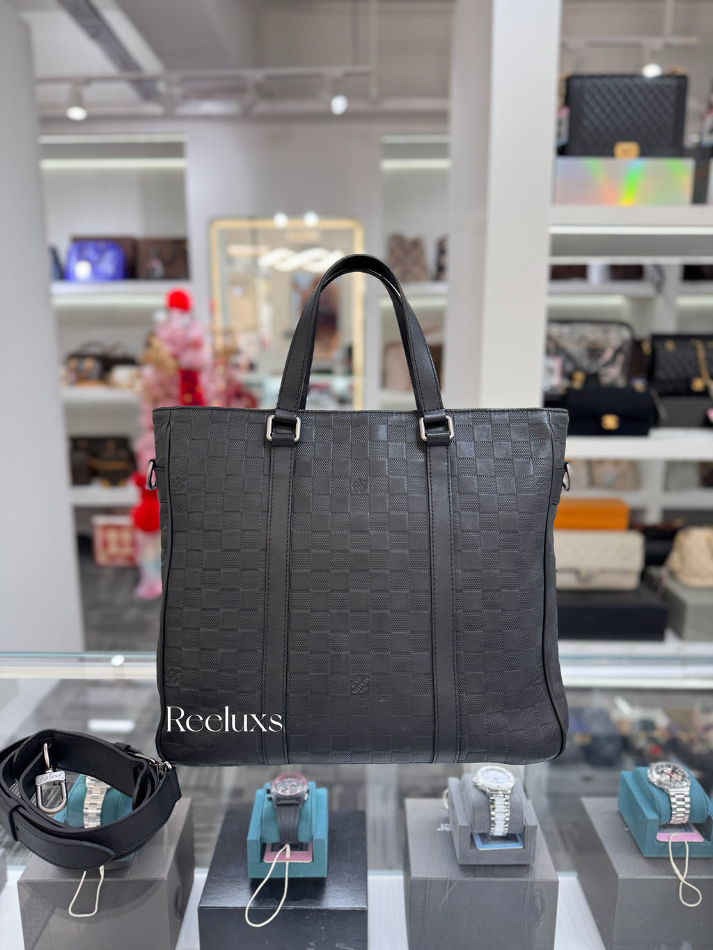 LOUIS VUITTON Tadao PM in Damier Infini