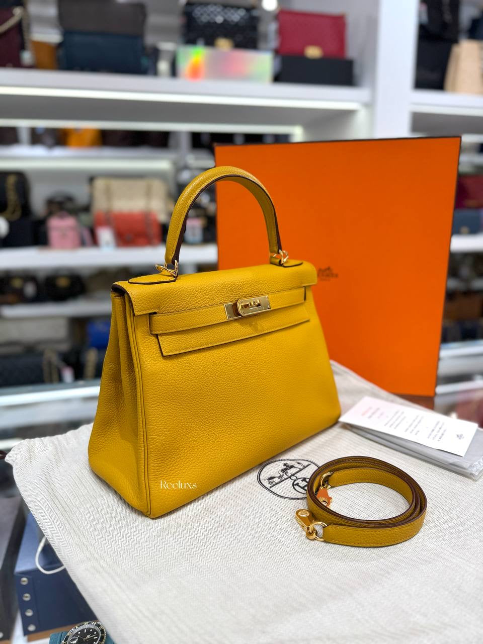 Full set HERMÈS Kelly 28 Retoure Bag in Jaune Ambre Togo GHW
