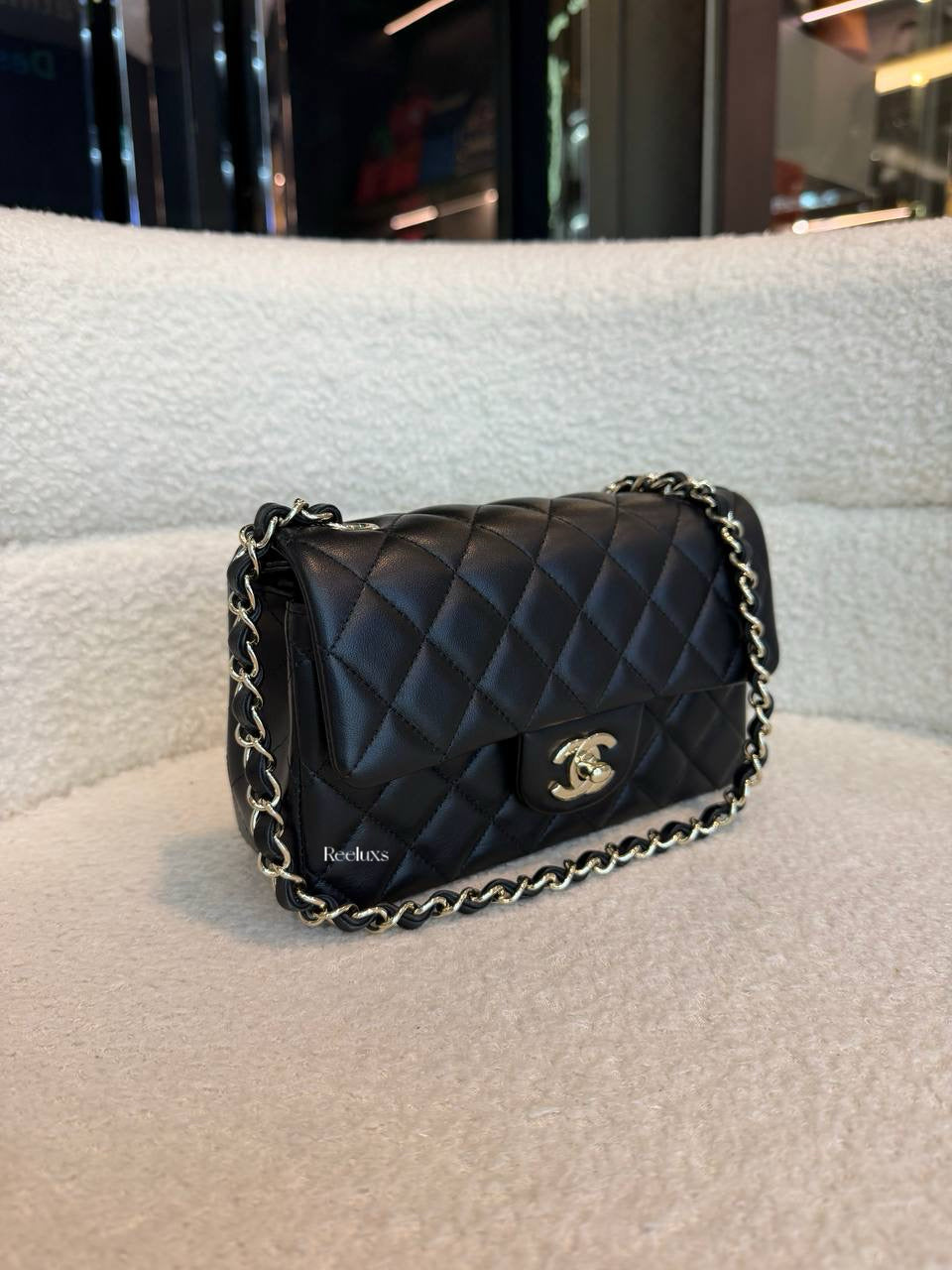 Chanel Classic Mini Flap Bag in black lambskin leather