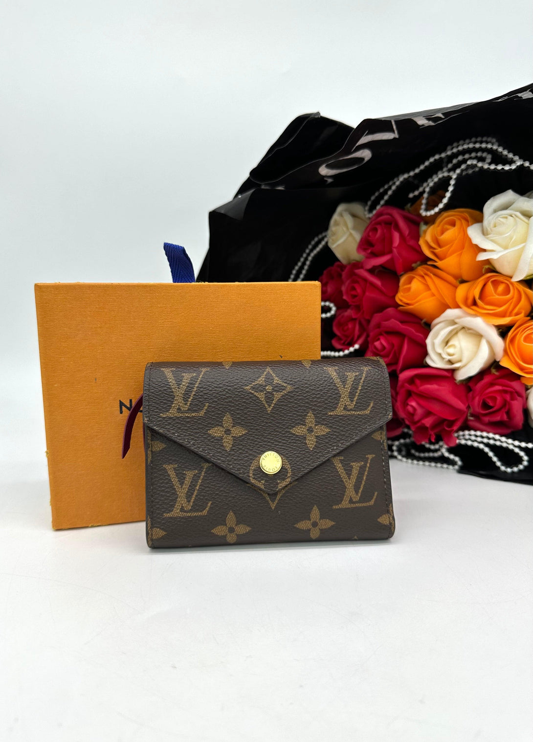 LOUIS VUITTON Monogram Canvas Victorine Wallet - Reeluxs 