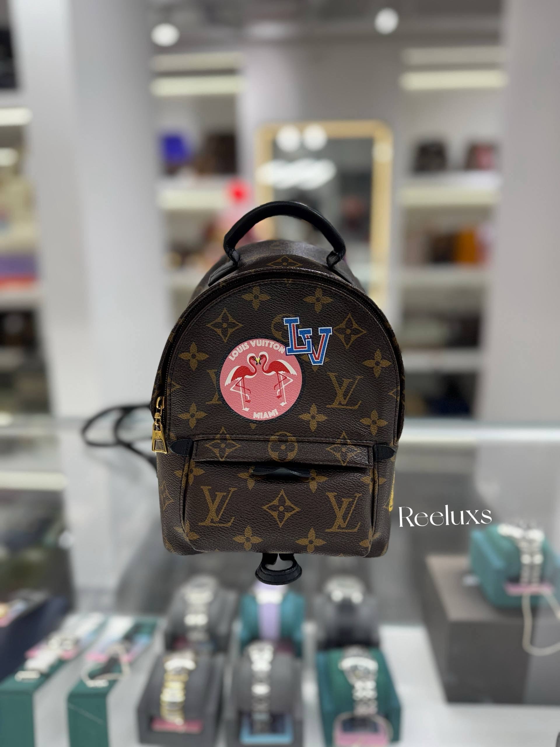 louis vuitton backpack mii LOUIS VUITTON Monogram My World Tour Palm Springs Mini Backpack