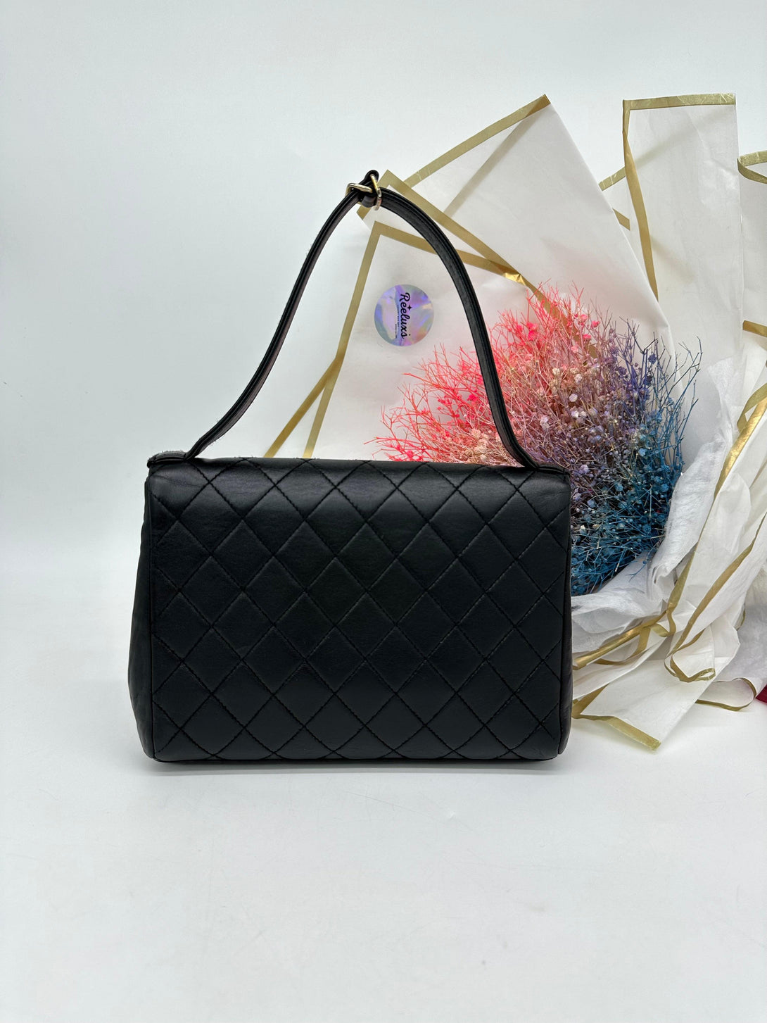 CHANEL Black Quilted Lambskin Vintage Classic Top Handle Clutch - Reeluxs 