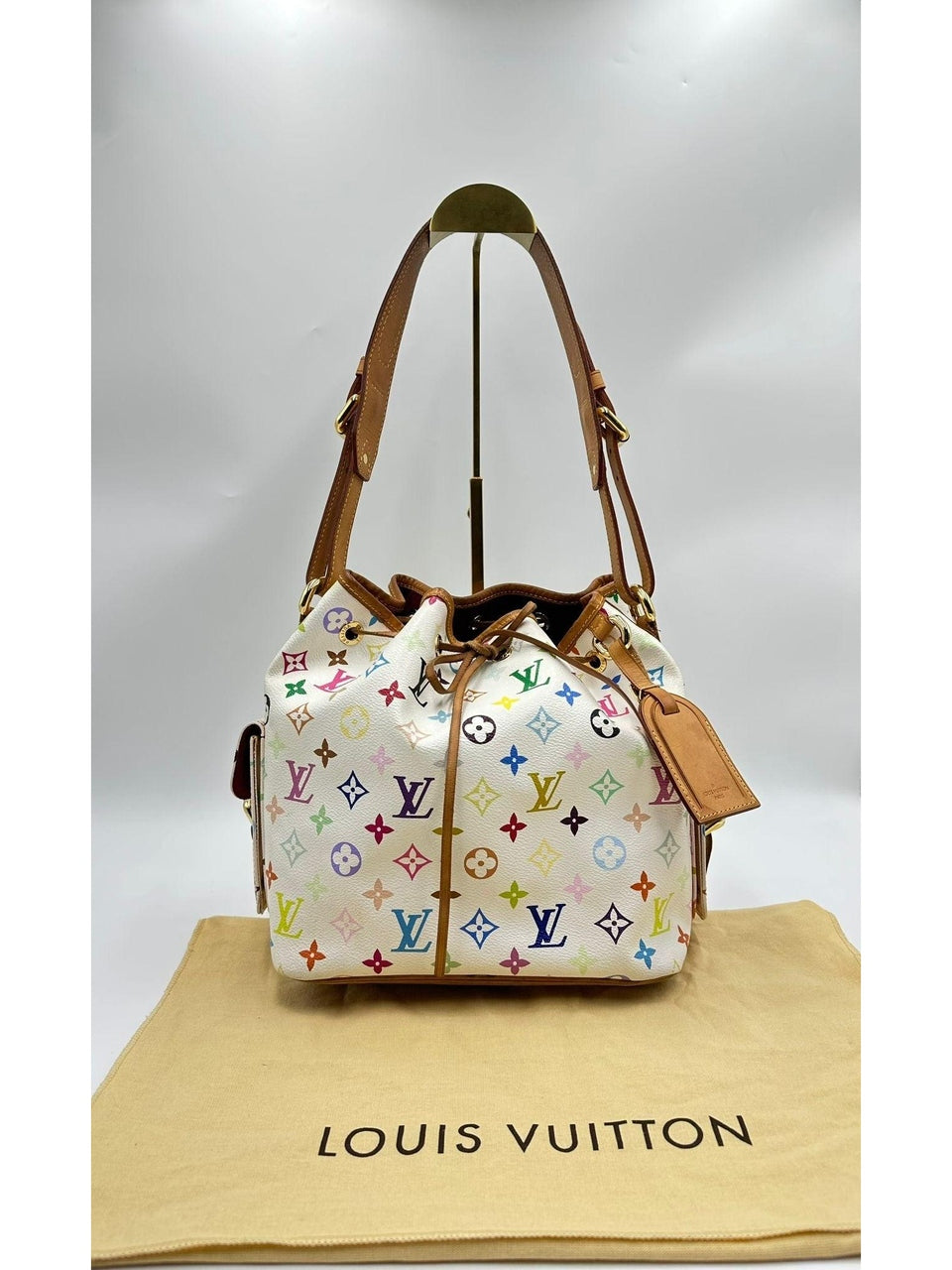 LOUIS VUITTON
Limited Edition Takashi Murakami X White Monogram Multicolore Noe Petite MM - Reeluxs 