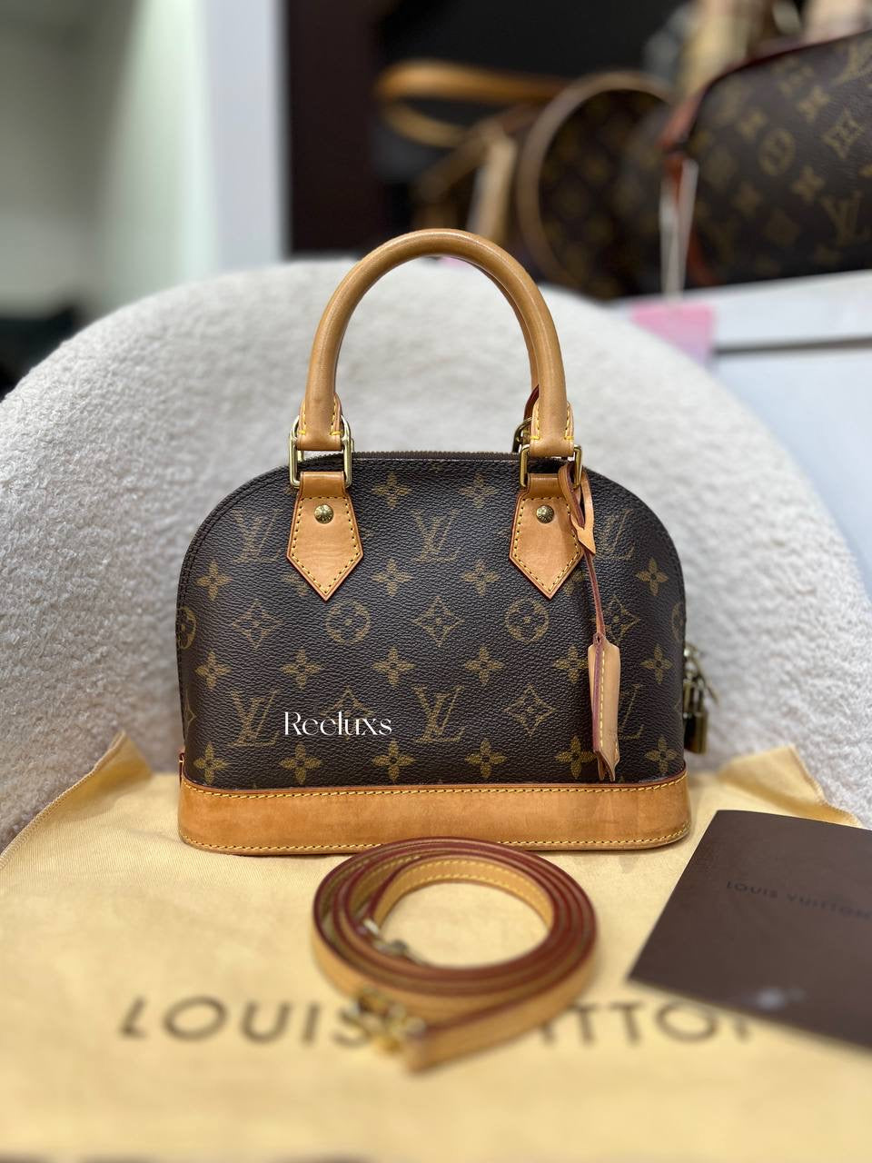 LOUIS VUITTON Alma BB Handbag Iconic Monogram Canvas