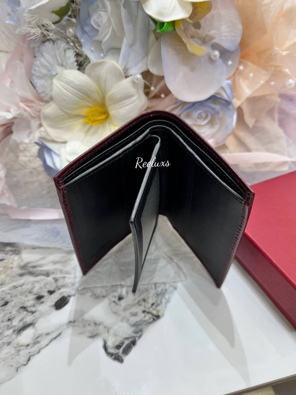 SALVATORE FERRAGAMO Embossed Gancini Wine Leather Bifold Wallet