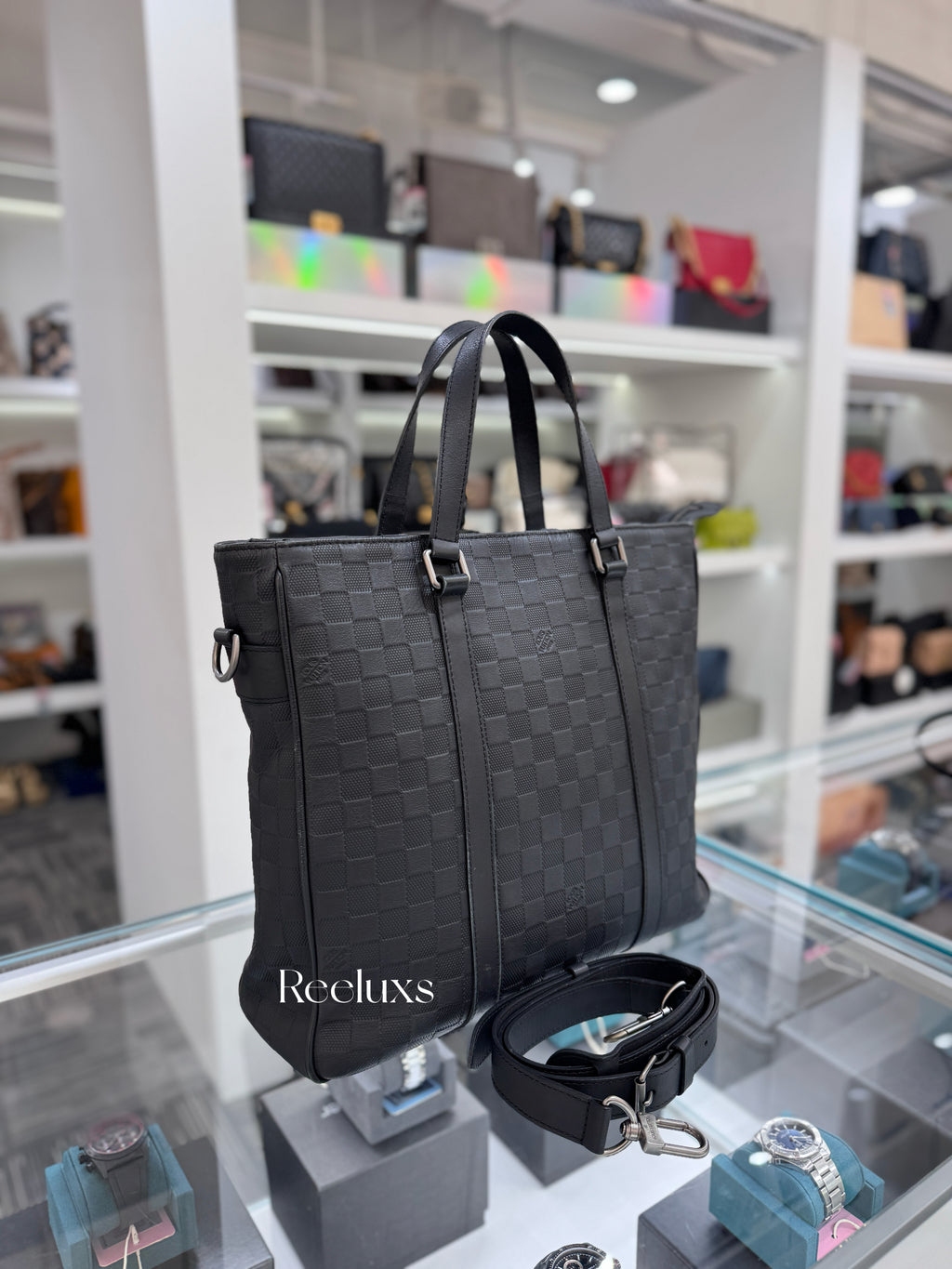 LOUIS VUITTON Tadao PM in Damier Infini