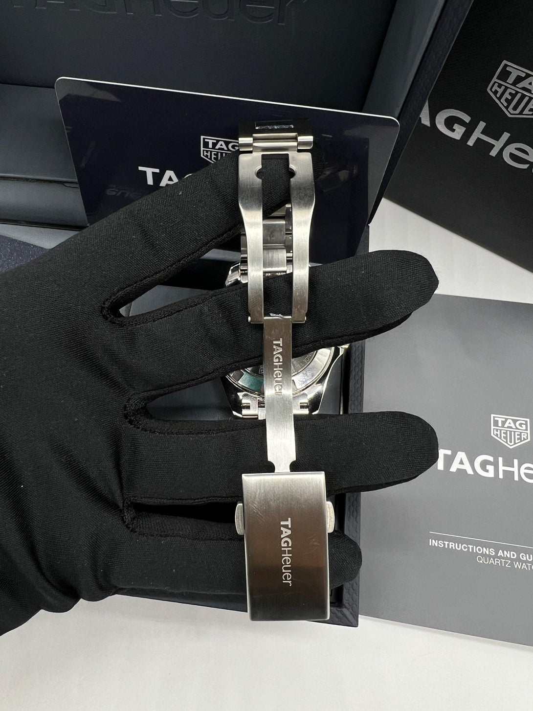 TAG Heuer Aquaracer 300M Quartz Stainless Steel Mid Size Wristwatch with Black Mother of Pearl Diamond Dial and Ceramic Bezel Ref WAY131M - Reeluxs 