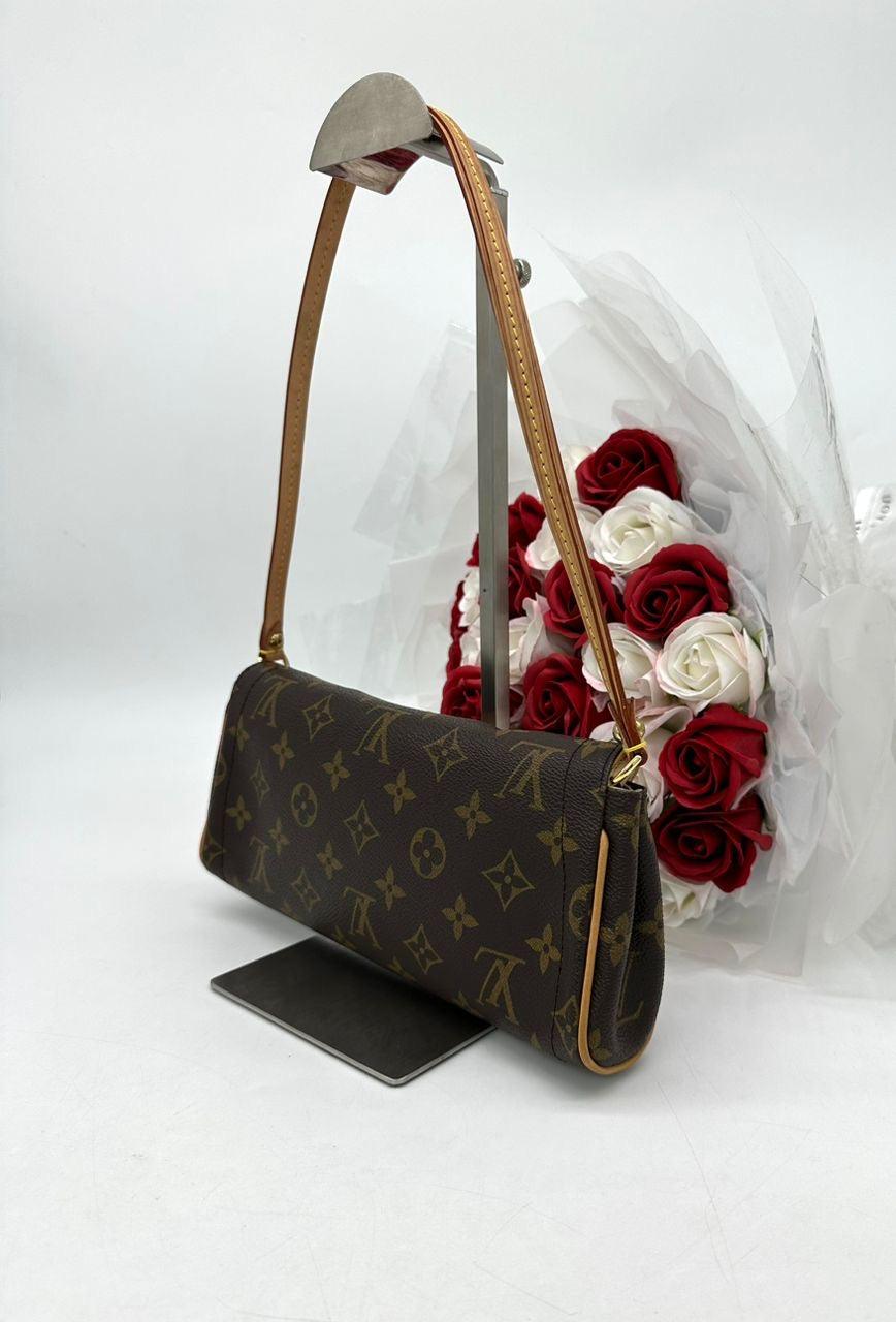 Louis Vuitton
Brown Monogram Beverly Pochette Bag - Reeluxs 