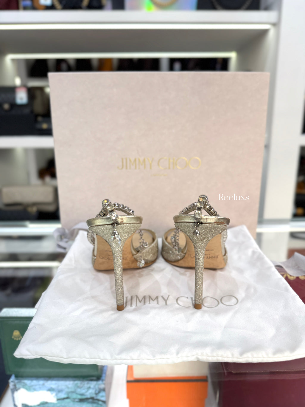 JIMMY CHOO Saeda 100 Sandals in a Platinum Ice Glitter