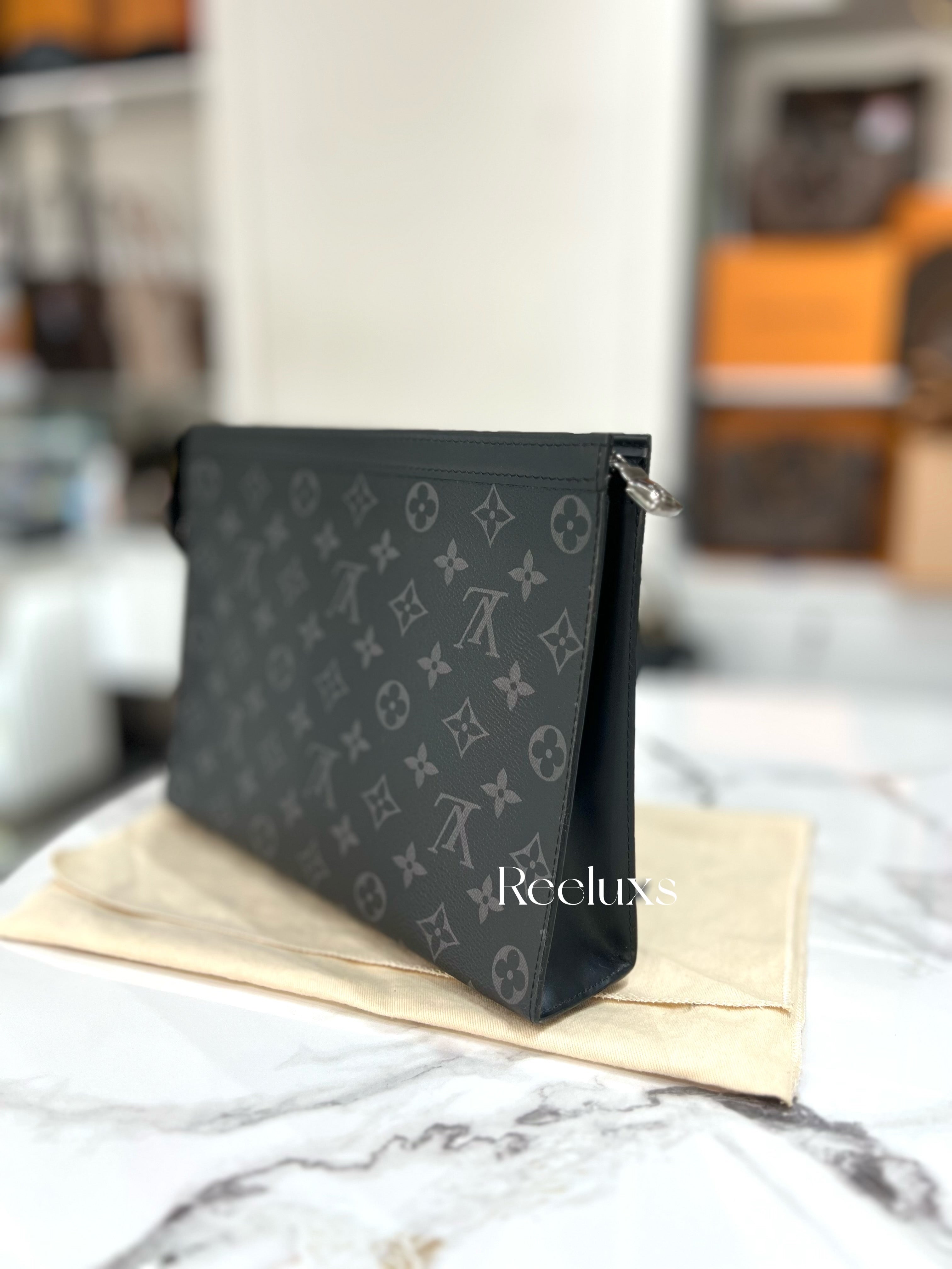 LOUIS VUITTON Pochette Voyage MM in Monogram Eclipse Canvas