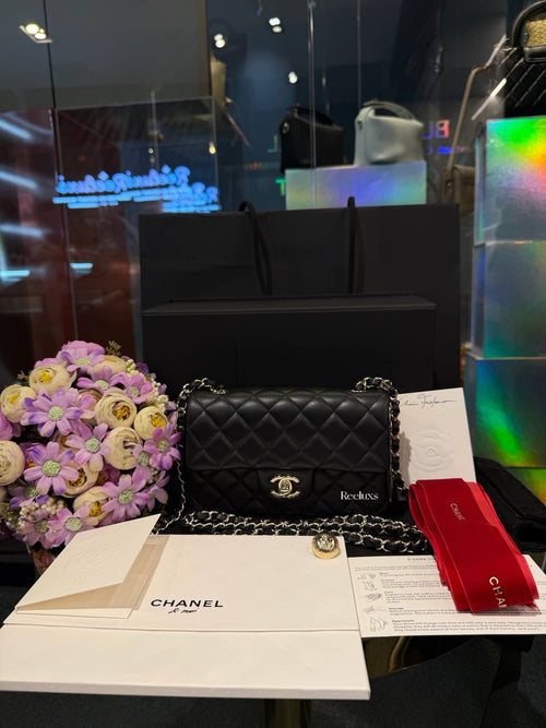 Chanel Classic Mini Flap Bag in black lambskin leather