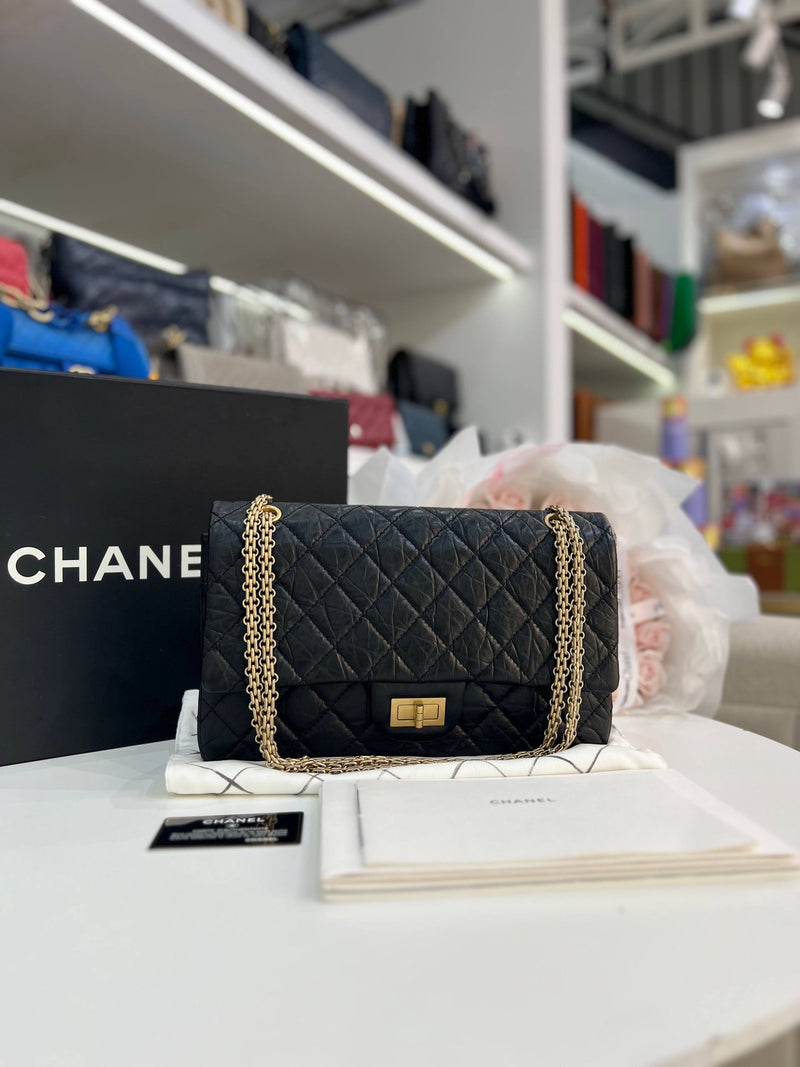 CHANEL 2.55 Reissue Double Flap Bag In Black Aged Calfskin