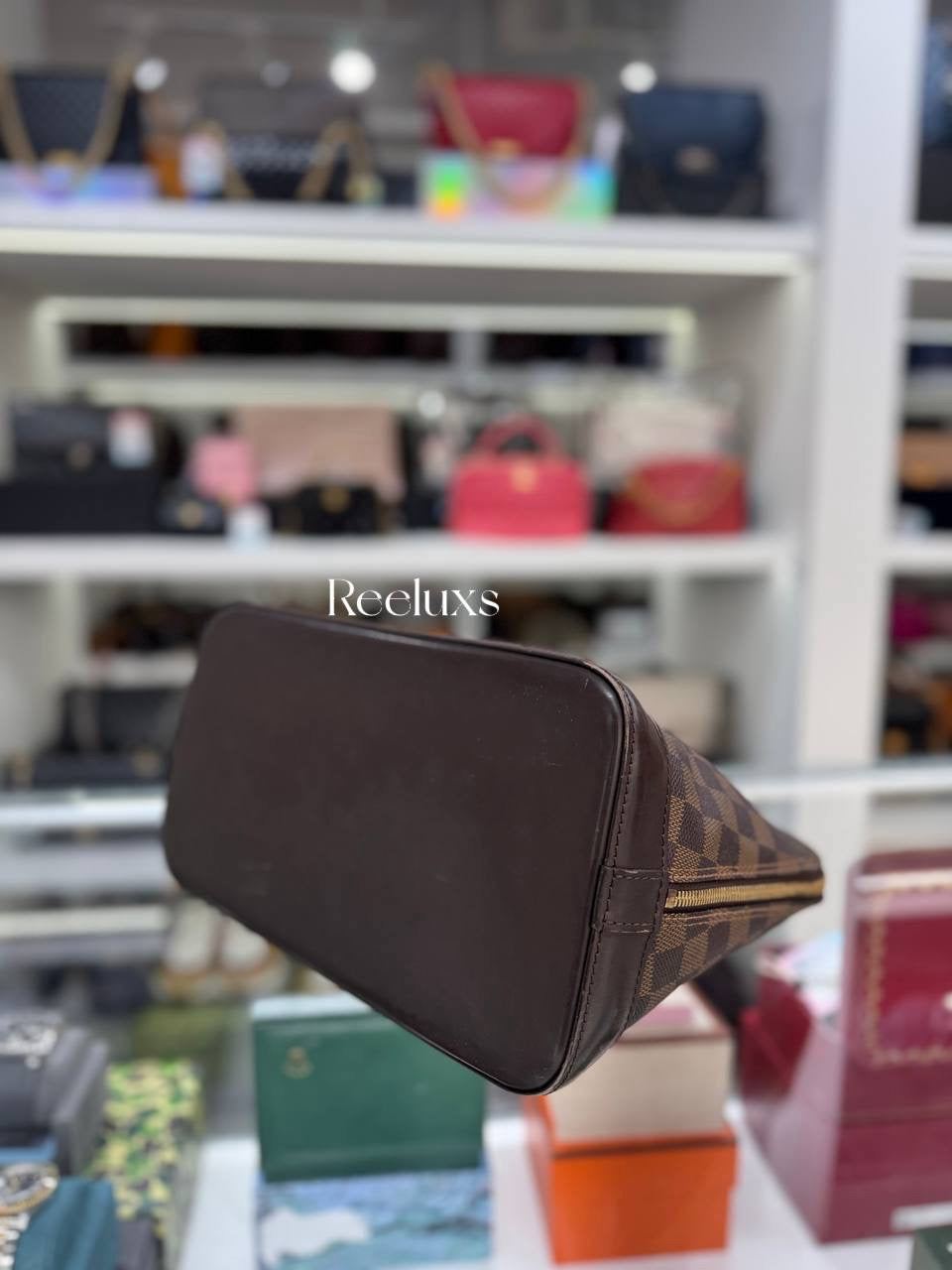 LOUIS VUITTON Alma PM Handbag in Damier Ebene Coated Canvas