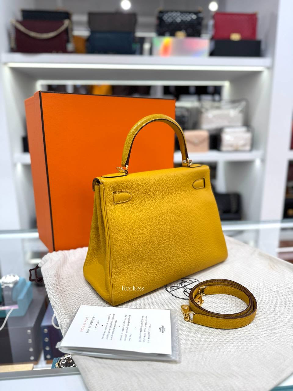 Full set HERMÈS Kelly 28 Retoure Bag in Jaune Ambre Togo GHW