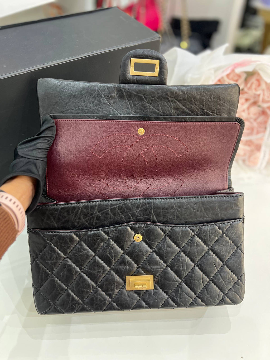 CHANEL 2.55 Reissue Double Flap Bag In Black Aged Calfskin