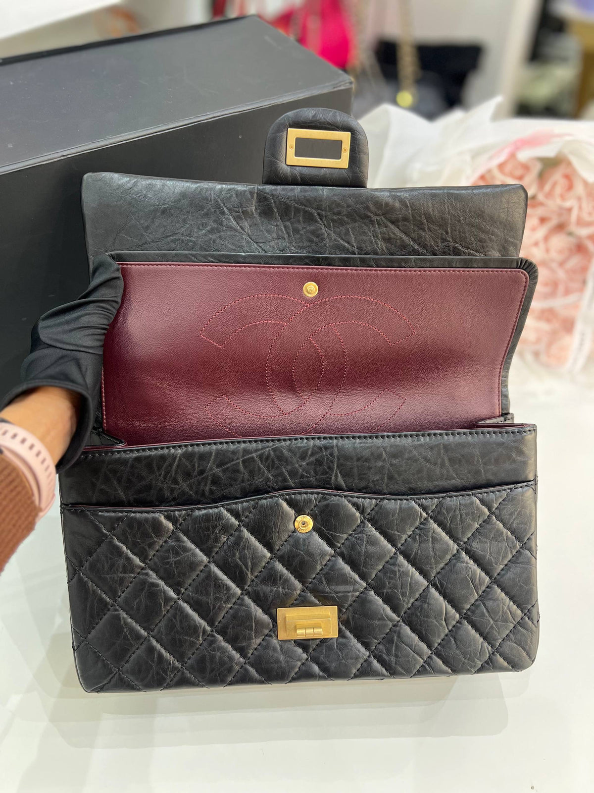 CHANEL 2.55 Reissue Double Flap Bag In Black Aged Calfskin