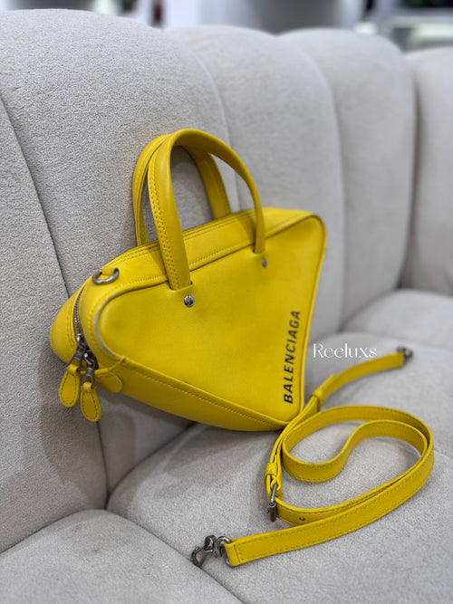 BALENCIAGA Triangle Duffle Bag In Yellow Calfskin Leather