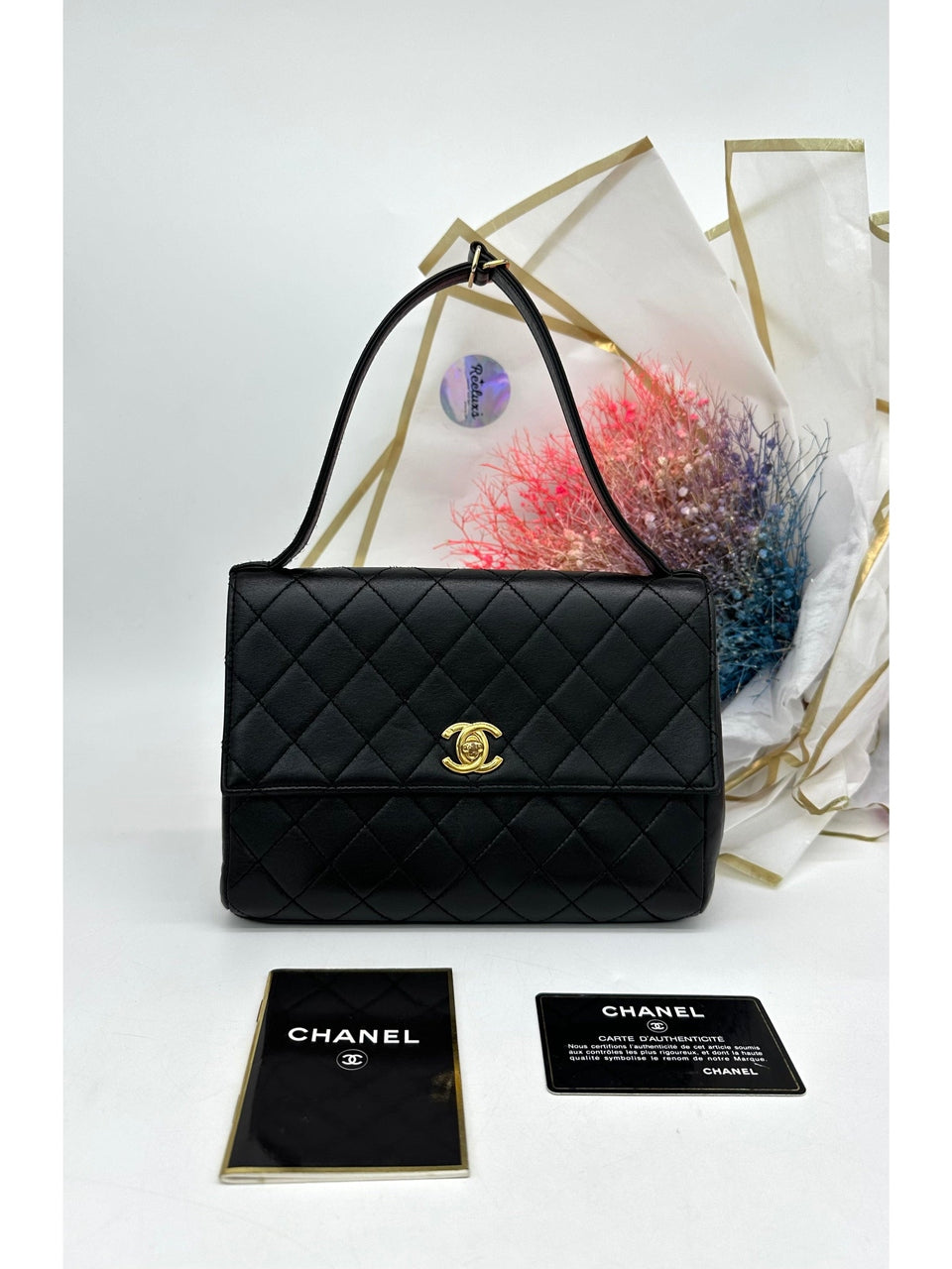 CHANEL Black Quilted Lambskin Vintage Classic Top Handle Clutch - Reeluxs 