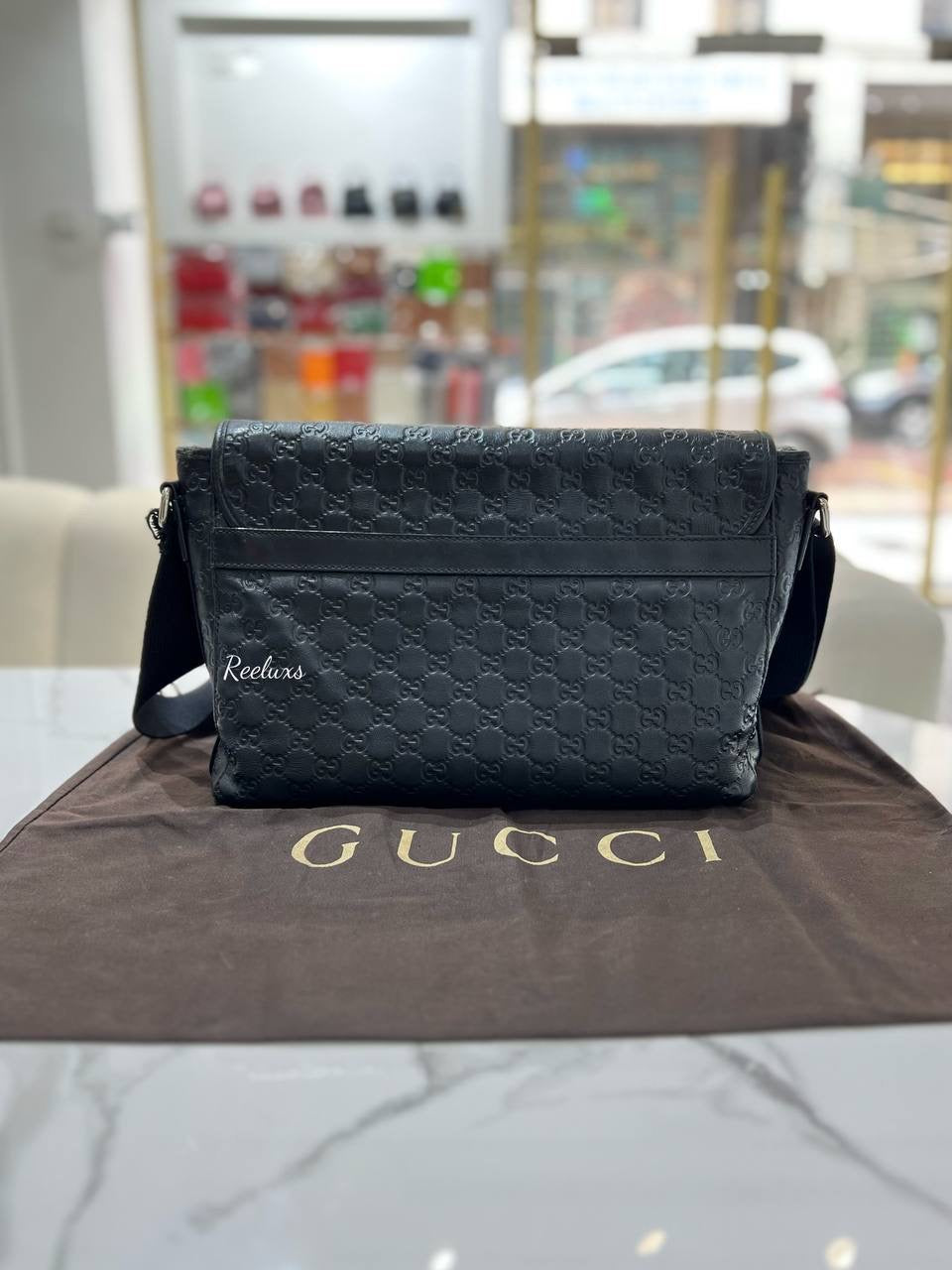 GUCCI Black Guccissima Crossbody Bag