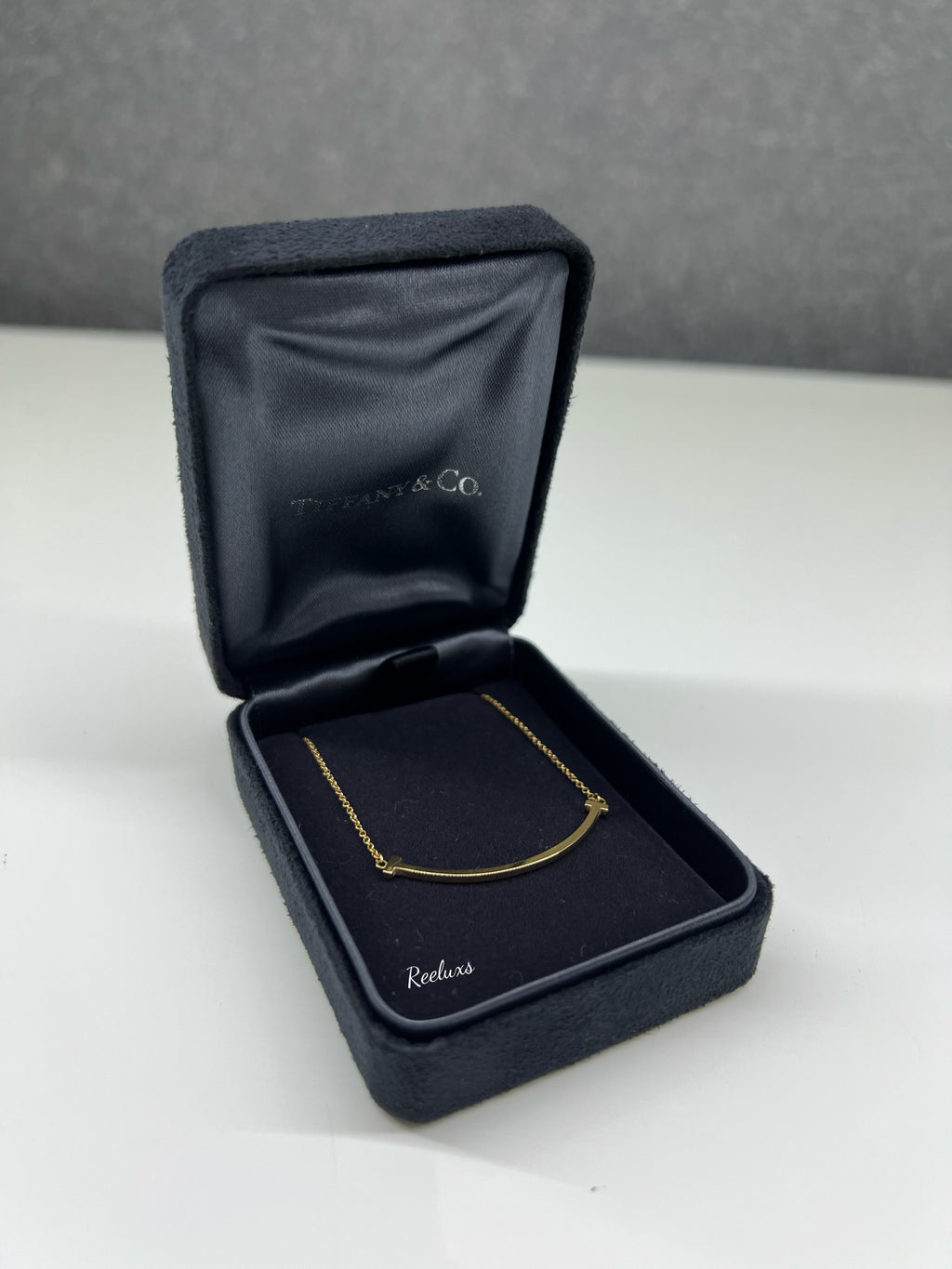 TIFFANY & CO. 18k Gold Small T Smile Pendant Necklace