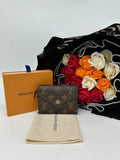 LOUIS VUITTON Monogram Canvas Victorine Wallet - Reeluxs 