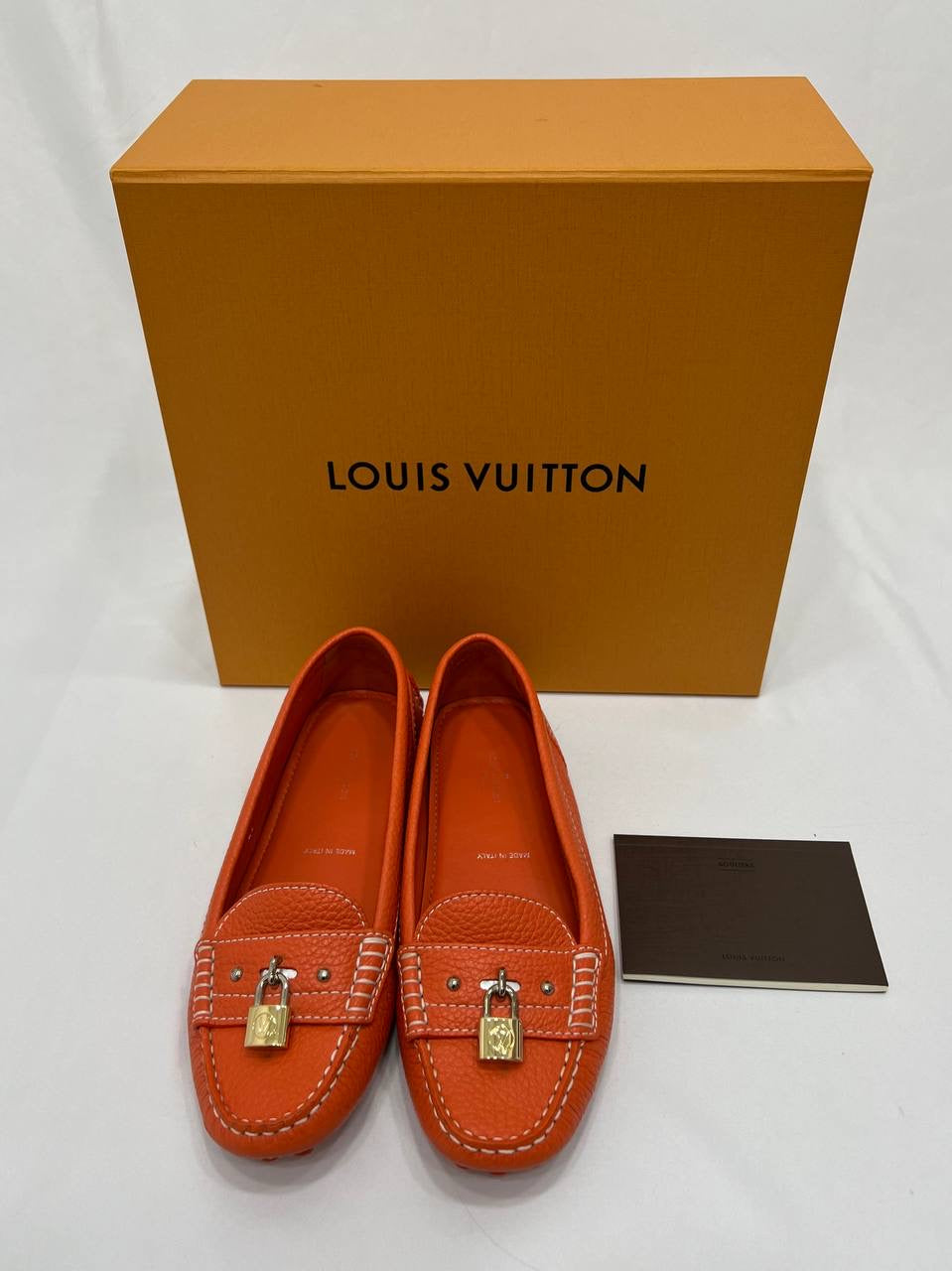 LOUIS VUITTON LV Orange Leather Lock Detail Slip On Loafer