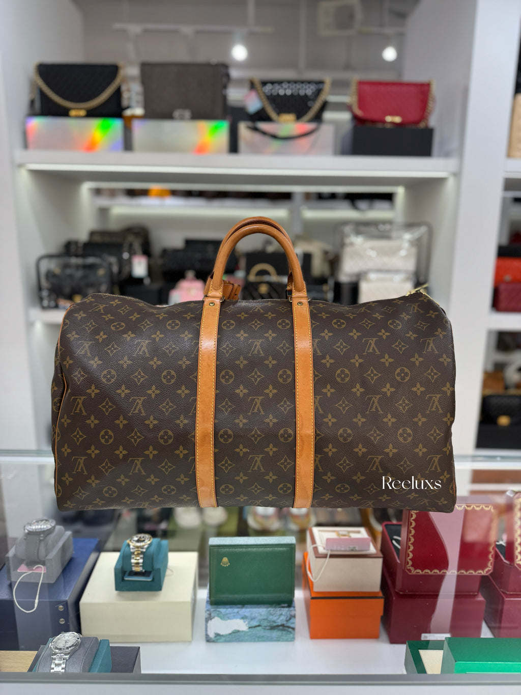 LOUIS VUITTON Keepall 55 Bandoulière Travel Bag