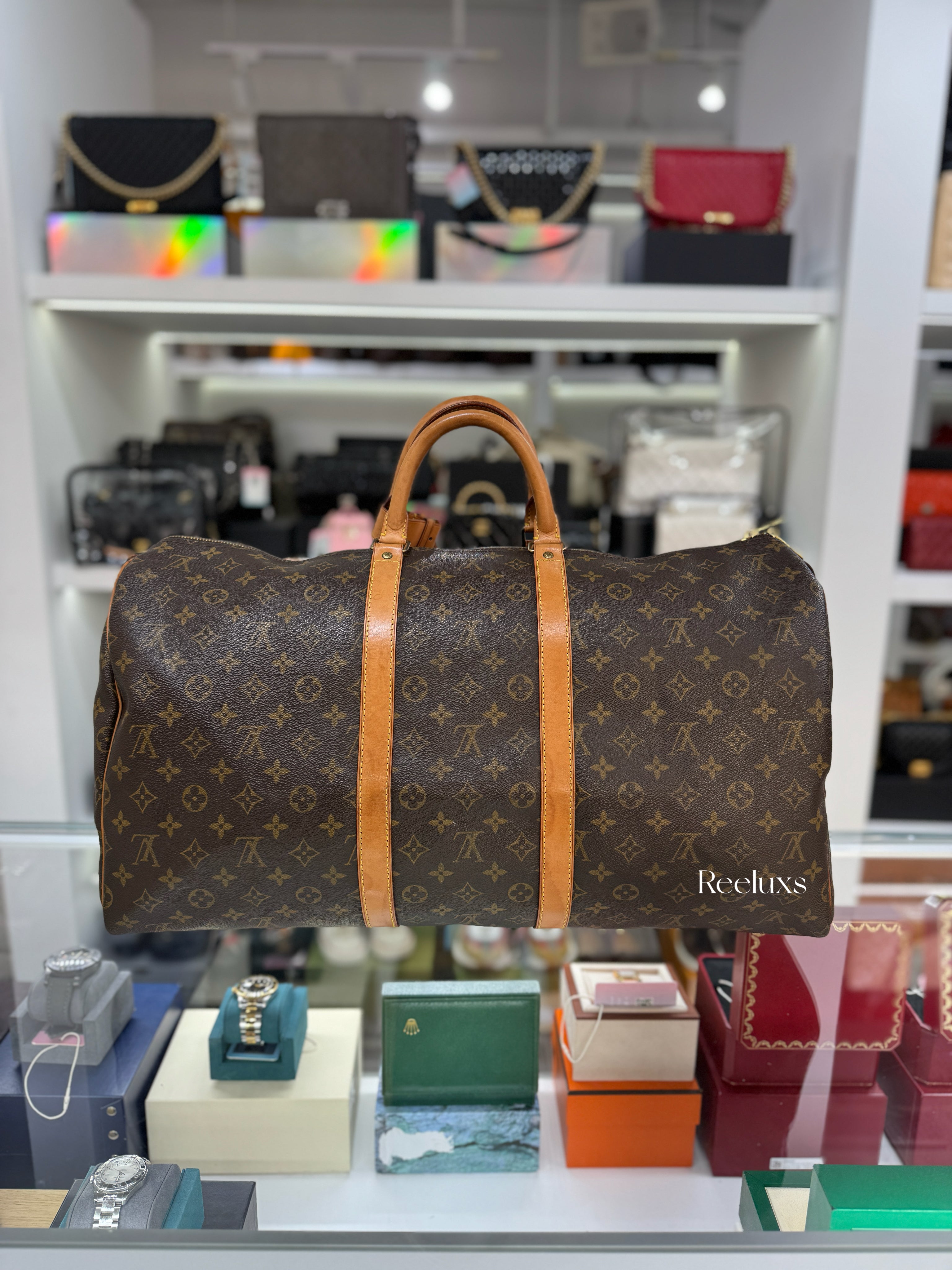 LOUIS VUITTON Keepall 55 Bandoulière Travel Bag