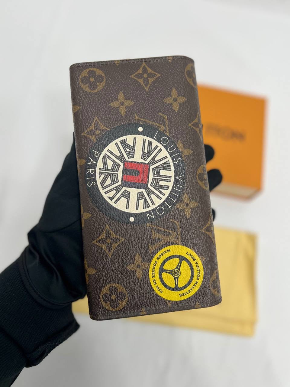 LOUIS VUITTON LV Brown Monogram World Tour Sarah Wallet