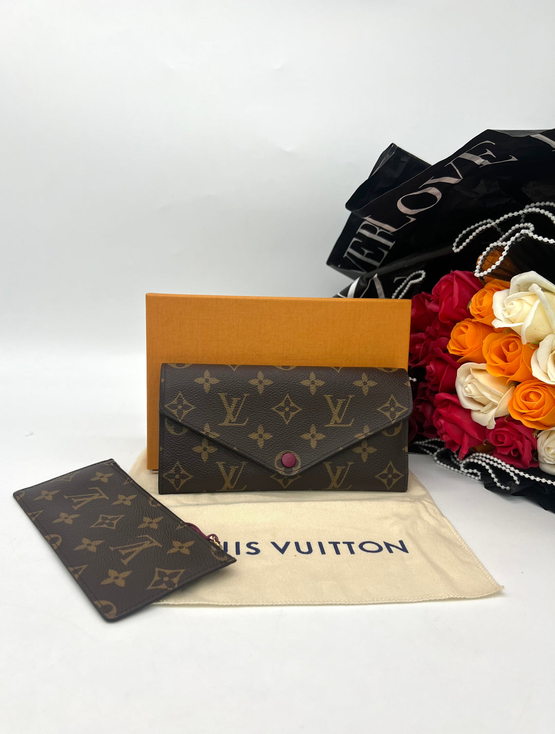 LOUIS VUITTON
Monogram Josephine Wallet