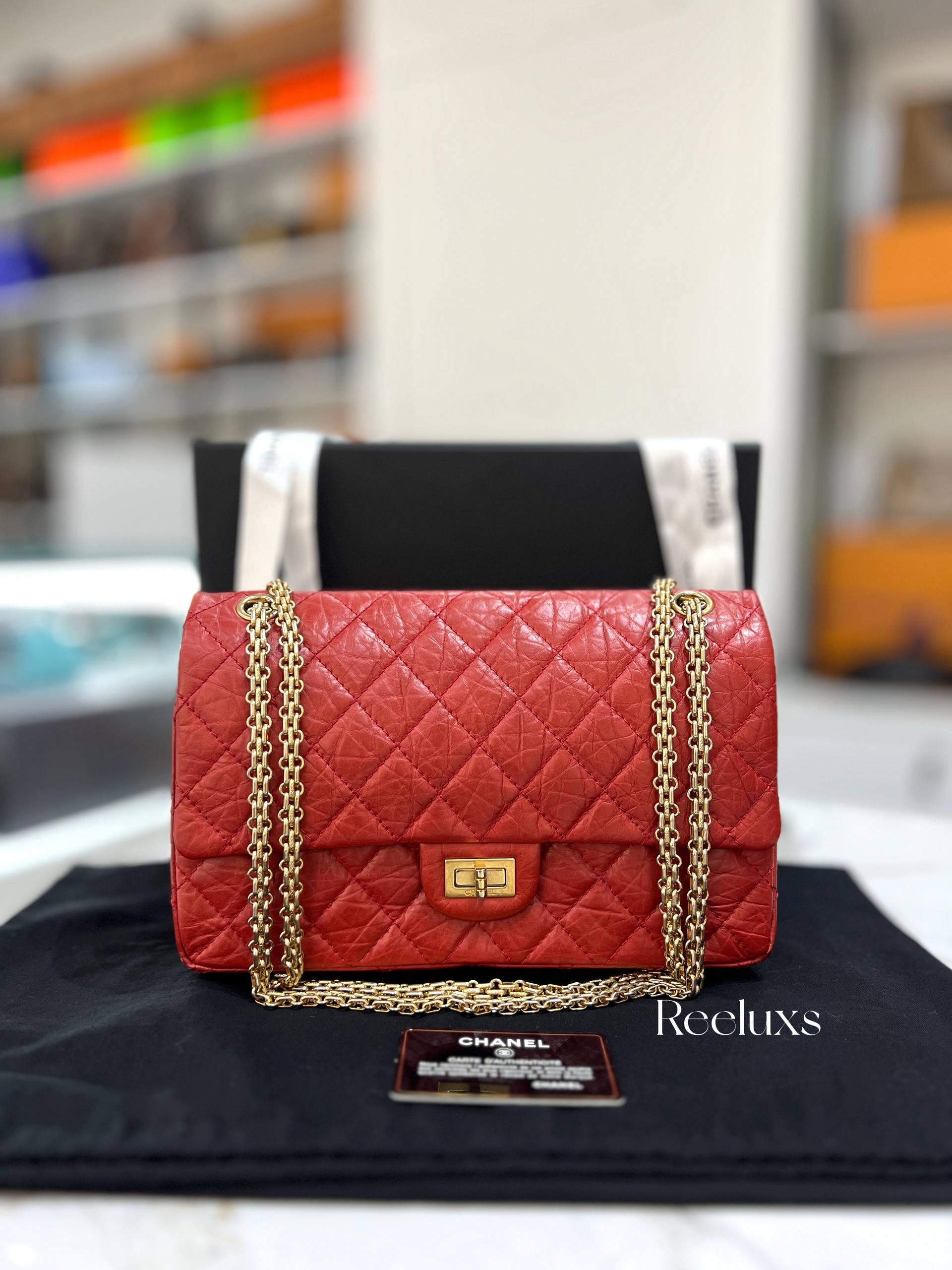 CHANEL Red Quilted Aged Leather Reissue 2.55 Classic Flap Bag GHW