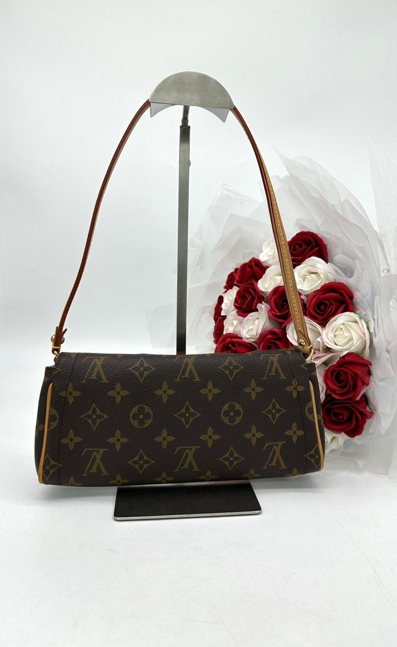 Louis Vuitton
Brown Monogram Beverly Pochette Bag - Reeluxs 